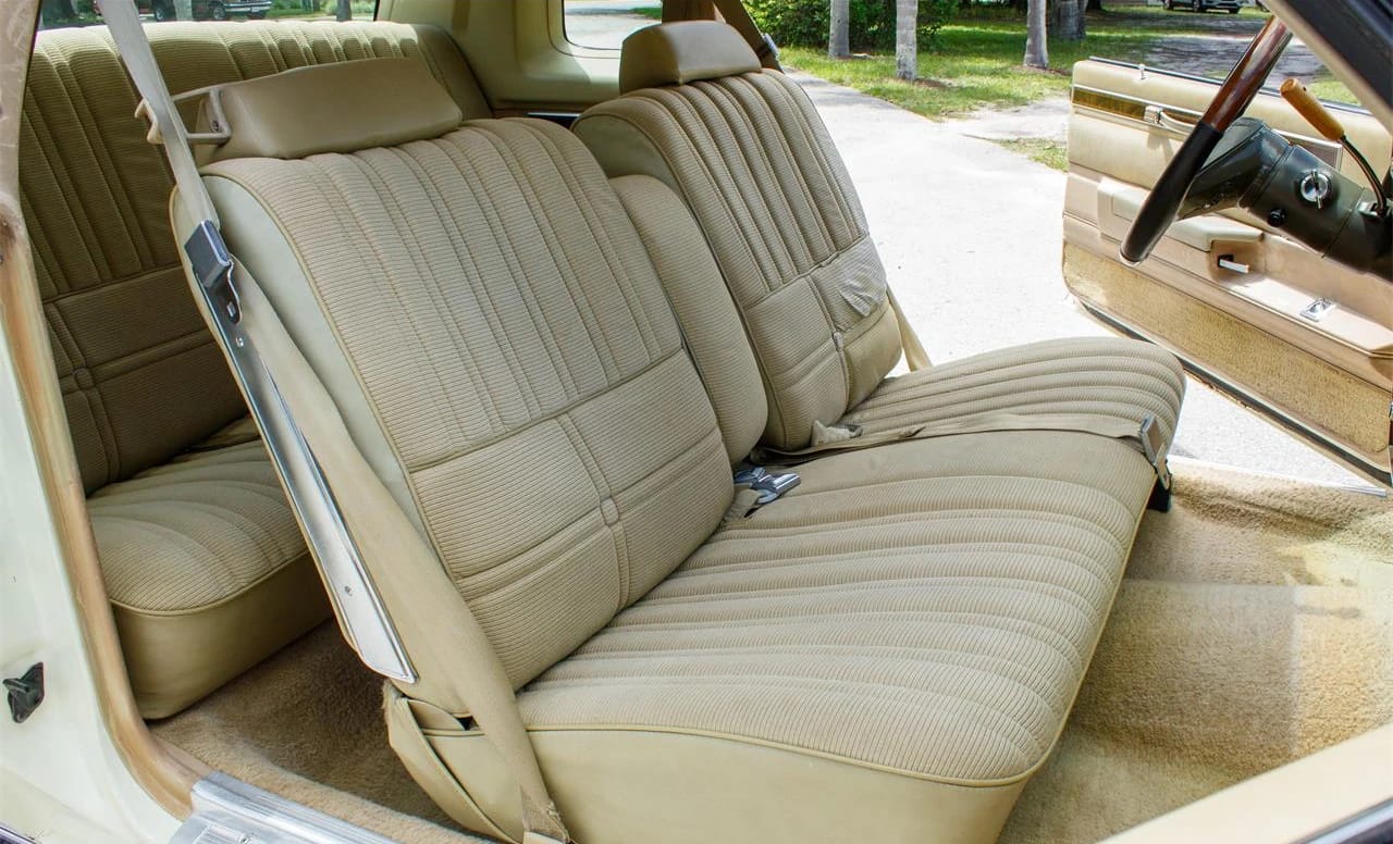 1981 Oldsmobile Cutlass Supreme Coupe: Still America's Favorite Intermediate, But No Longer Supreme 9 Front bench seat of a 1981 Olds Cutlass Supreme, seen through the open passenger door