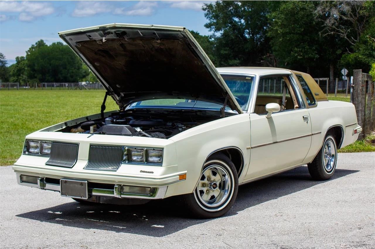 1981 Oldsmobile Cutlass Supreme Coupe: Still America's Favorite Intermediate, But No Longer Supreme 6 Left front 3q view of a Pastel Sauterne 1981 Oldsmobile Cutlass Supreme Coupe with its hood open