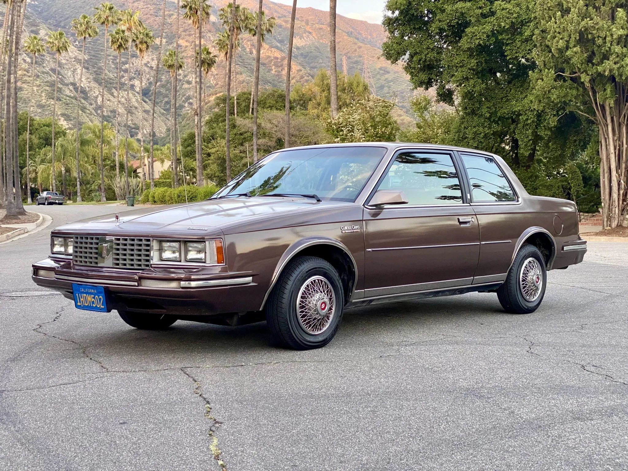 1981 Oldsmobile Cutlass Supreme Coupe: Still America's Favorite Intermediate, But No Longer Supreme 15 Left front 3q view of a two-tone 1983 Oldsmobile Cutlass Ciera