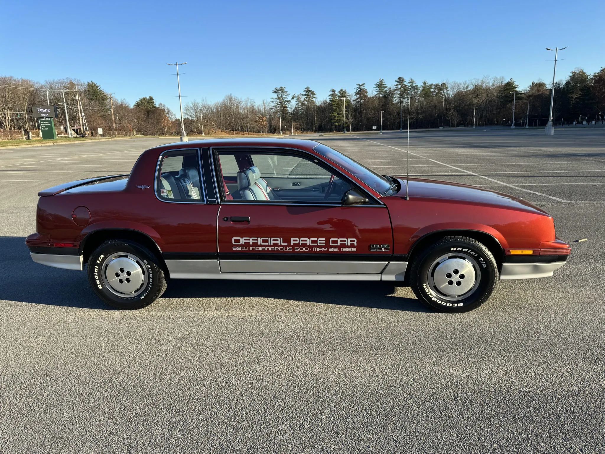 1981 Oldsmobile Cutlass Supreme Coupe: Still America's Favorite Intermediate, But No Longer Supreme 16 Right side view of a two-tone 1985 Oldsmobile N-body Calais coupe with Indy 500 Pace Car decals