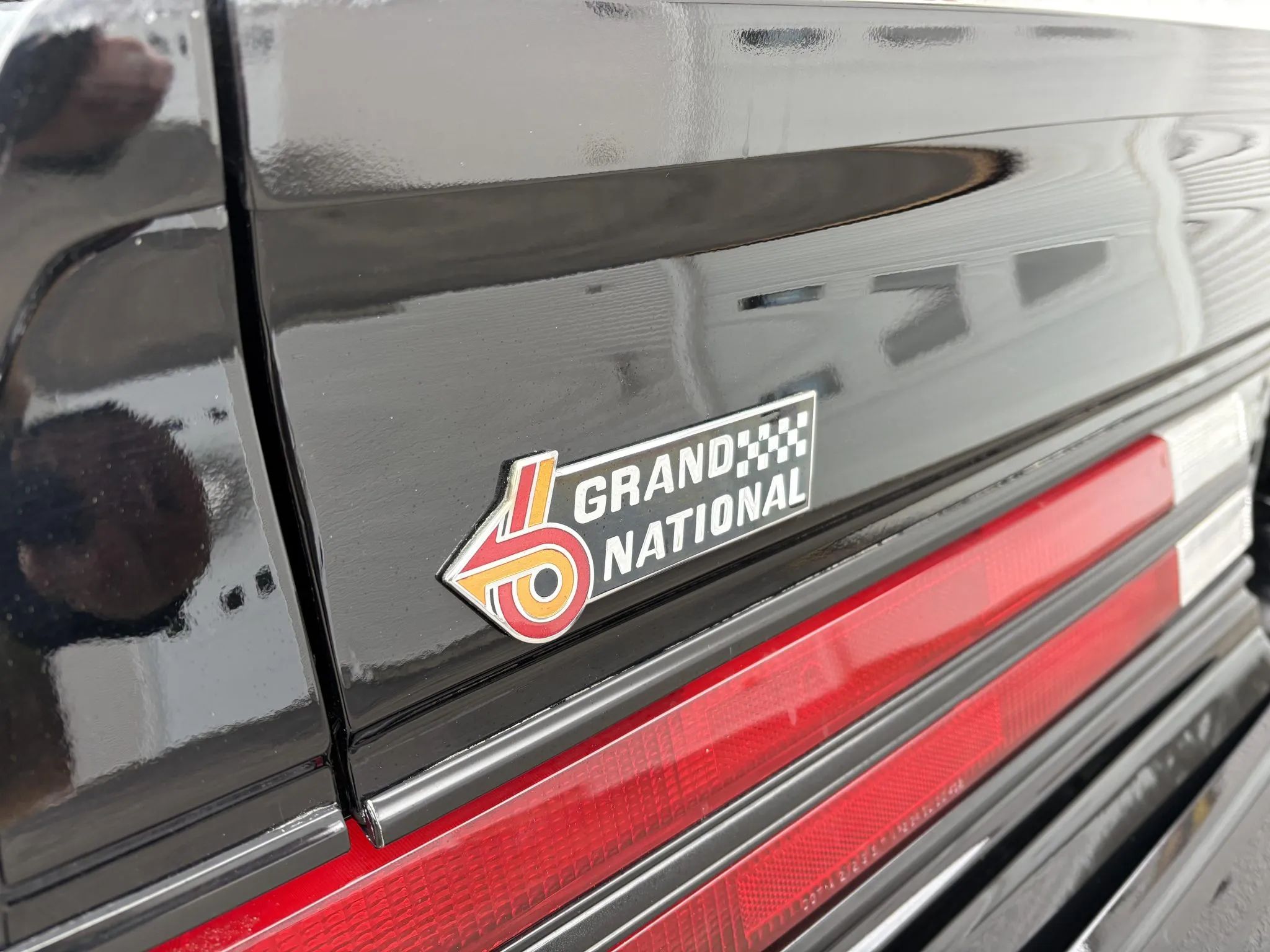 Grand National badge on a black car