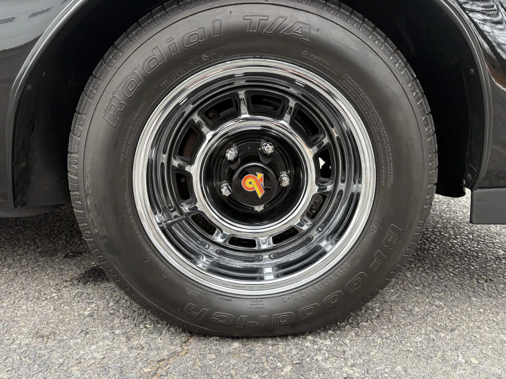 Black and chrome steel wheel with Grand National emblem