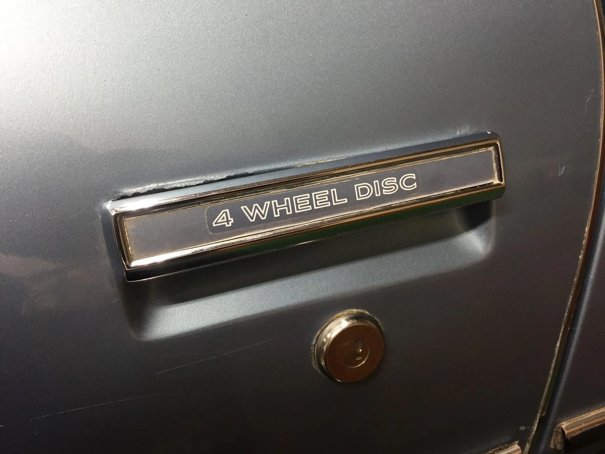 1981 Pontiac Firebird Trans Am: The Four-Speed Option Prepared Buyers For A Chevy-Powered Future 5 Door handle of 1981 Trans Am with "4 Wheel Disc" decal