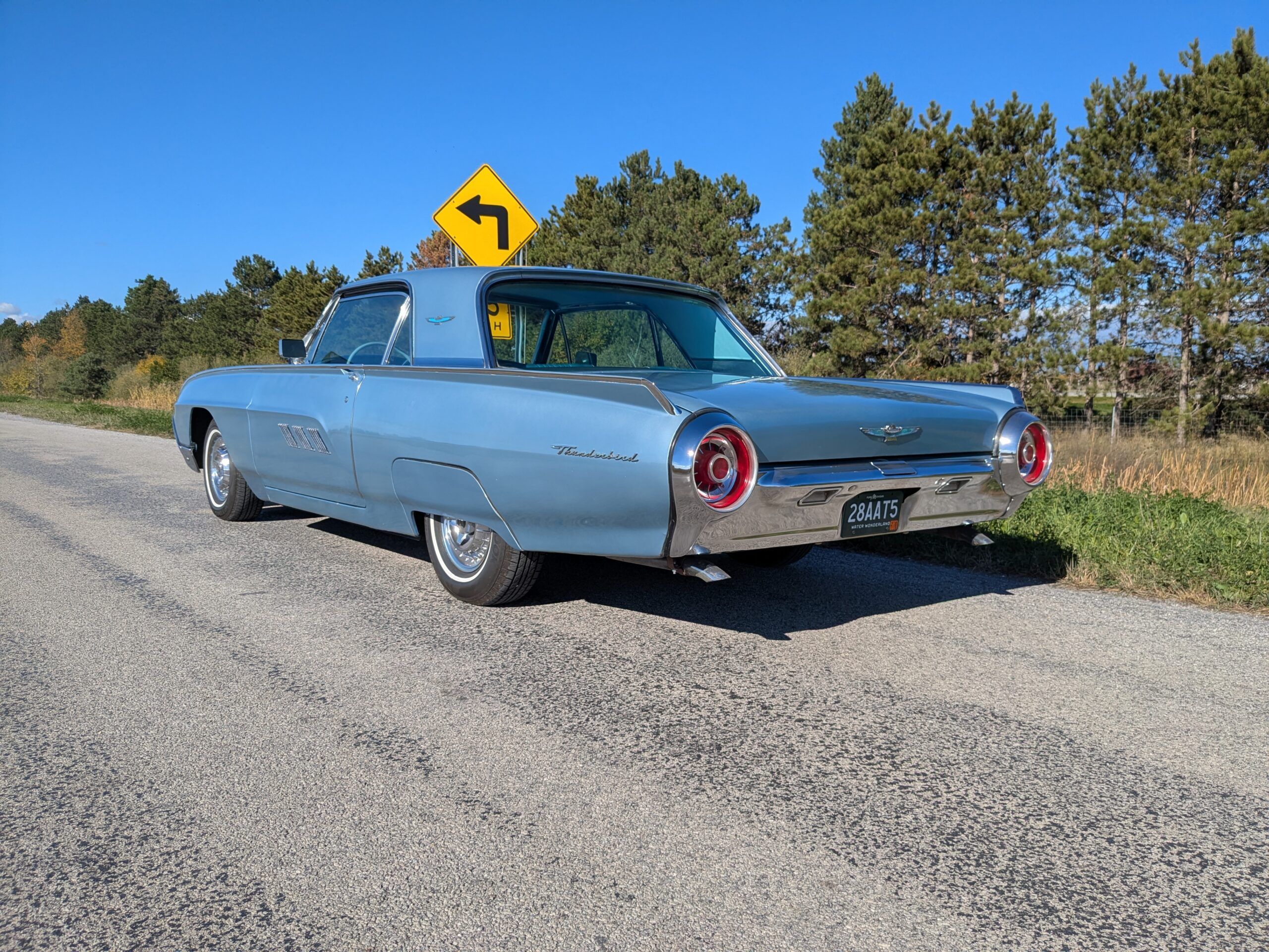 Deciphering The Build Sheets Of A 1960s Ford Thunderbird And Lincoln Continental 2 Driver's rear three-quarter image of blue 1963 Ford Thunderbird Hardtop