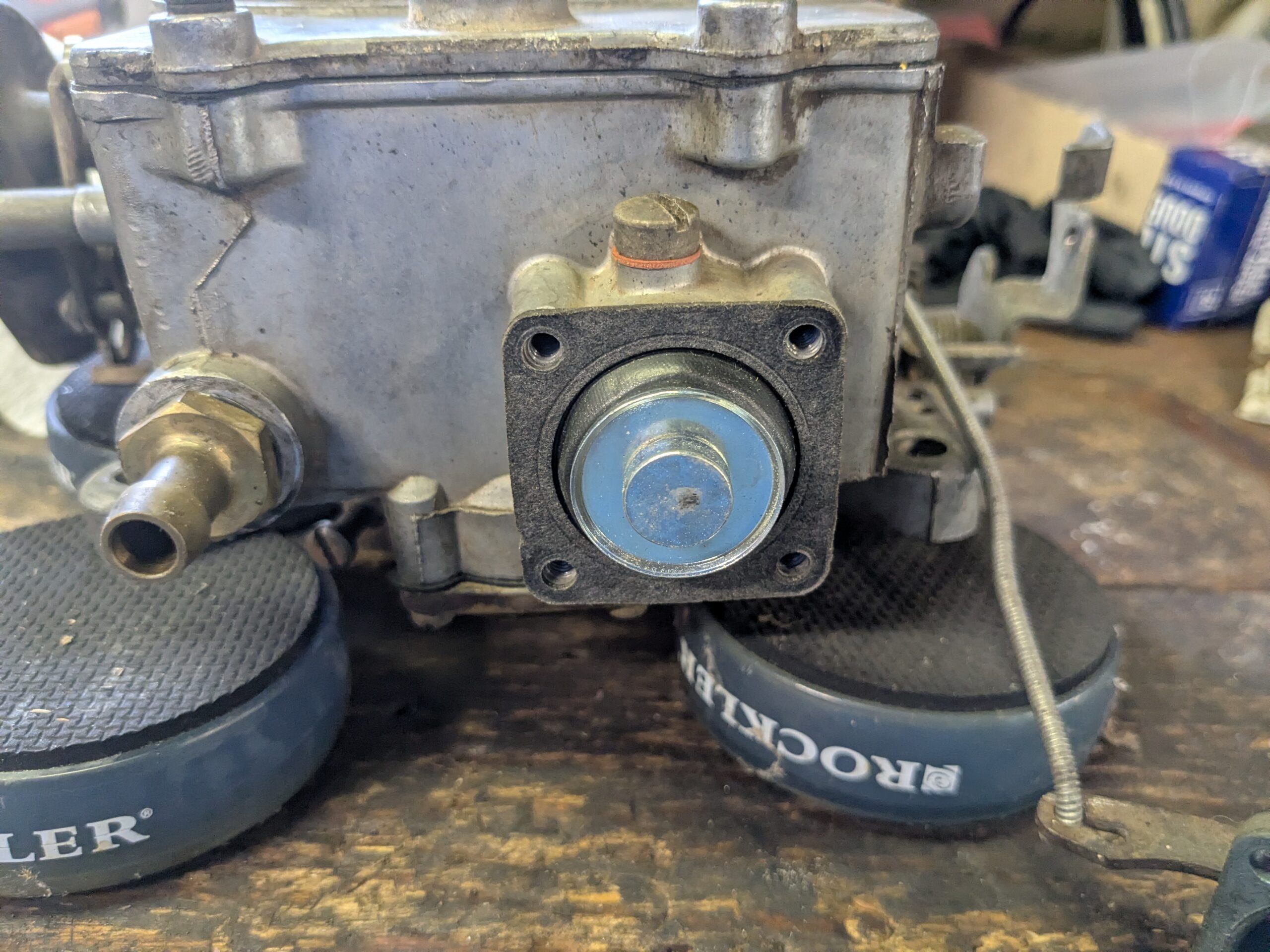 The accelerator pump diaphragm of a 1963 Autolite 2100 carburetor