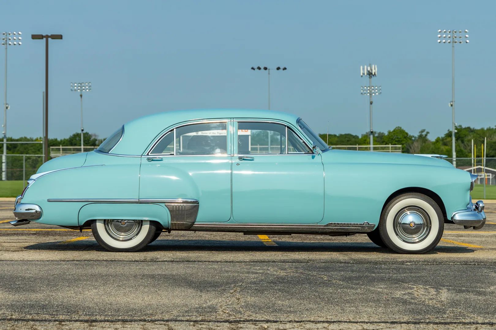 1949 Oldsmobile Rocket V-8 And The Ultra-High-Compression Economy Version That Never Made It 11 Right side view of a Crest Blue 1949 Oldsmobile 98 sedan