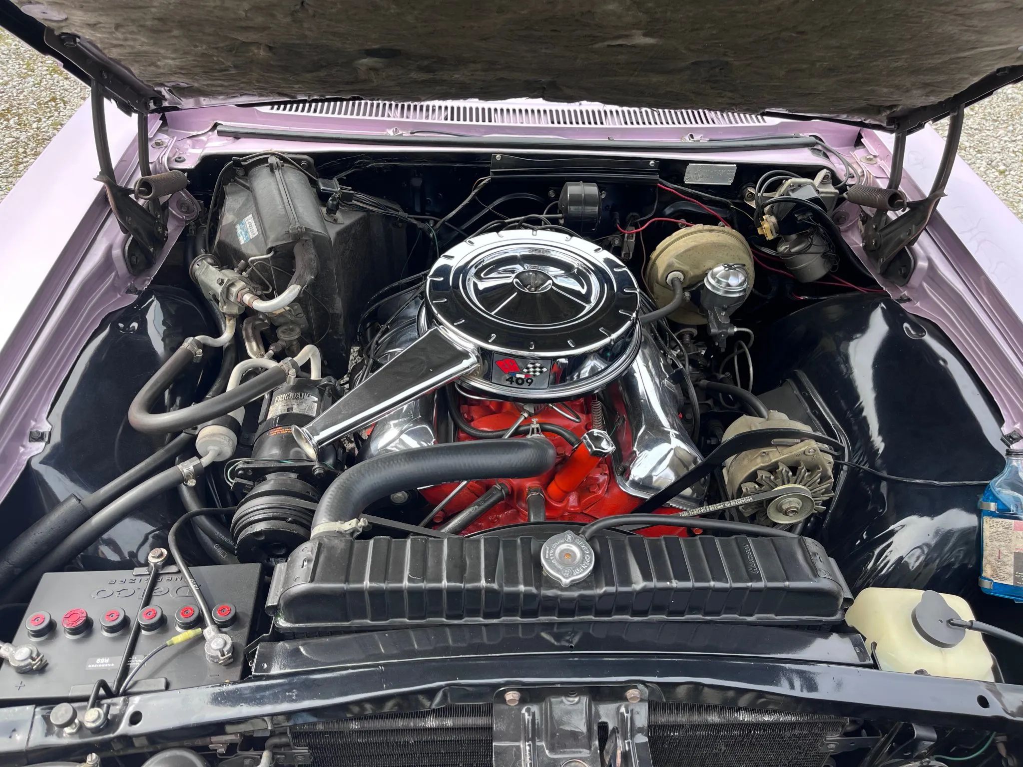 1965 Chevrolet Impala SS 409 4-Speed: In The Cool, Cool, Cool Of The Evening Orchid 16 V-8 engine in a 1965 Chevrolet