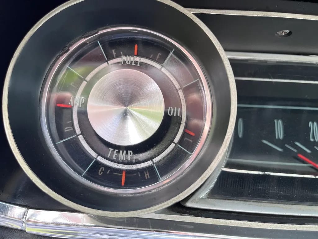 1965 Chevrolet Impala SS 409 4-Speed: In The Cool, Cool, Cool Of The Evening Orchid 11 Secondary gauges in a 1965 Chevrolet