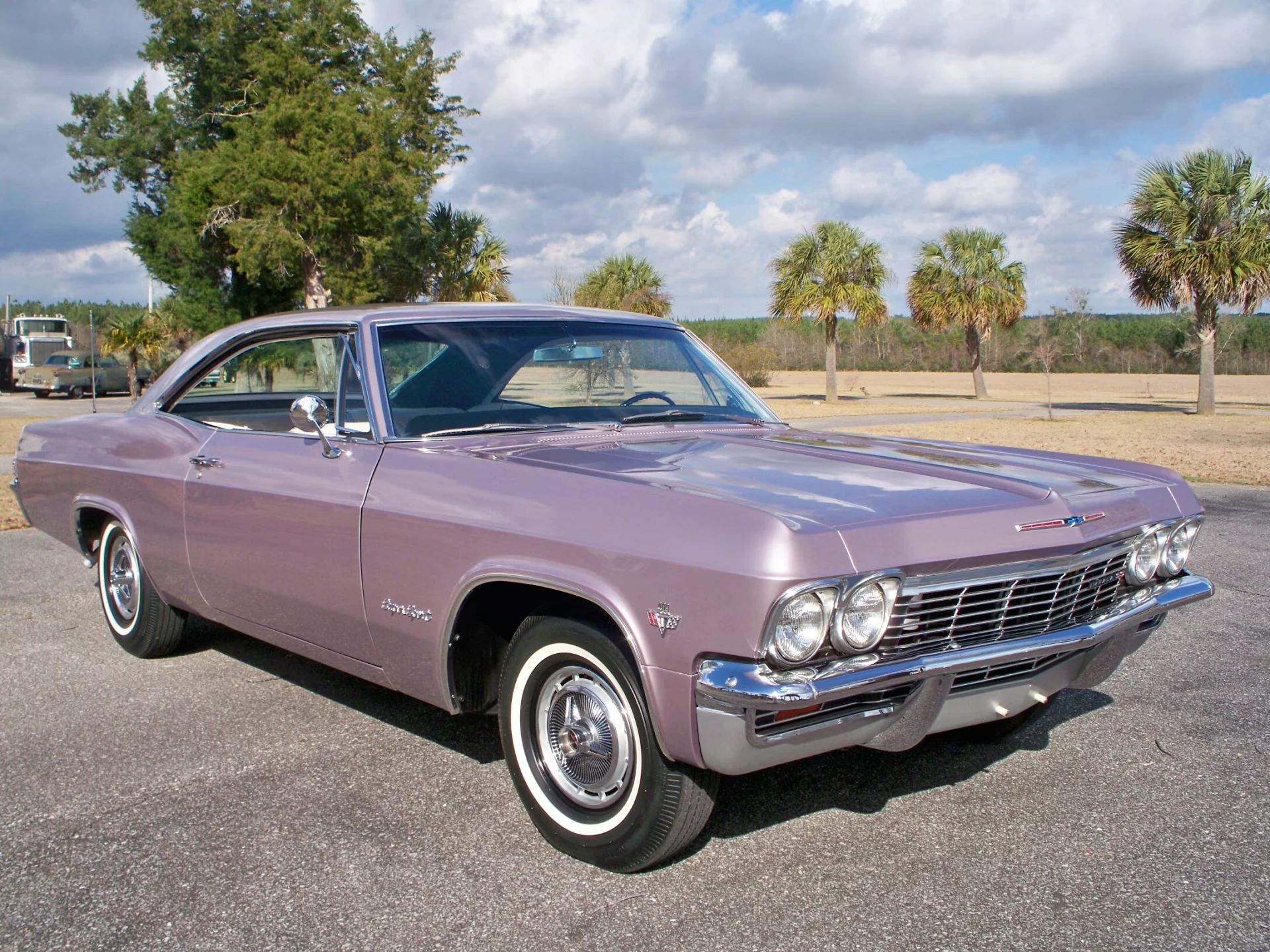 1965 Chevrolet Impala SS 409 4-Speed: In The Cool, Cool, Cool Of The Evening Orchid 18 Right front 3q view of a 1965 Chevrolet two-door hardtop