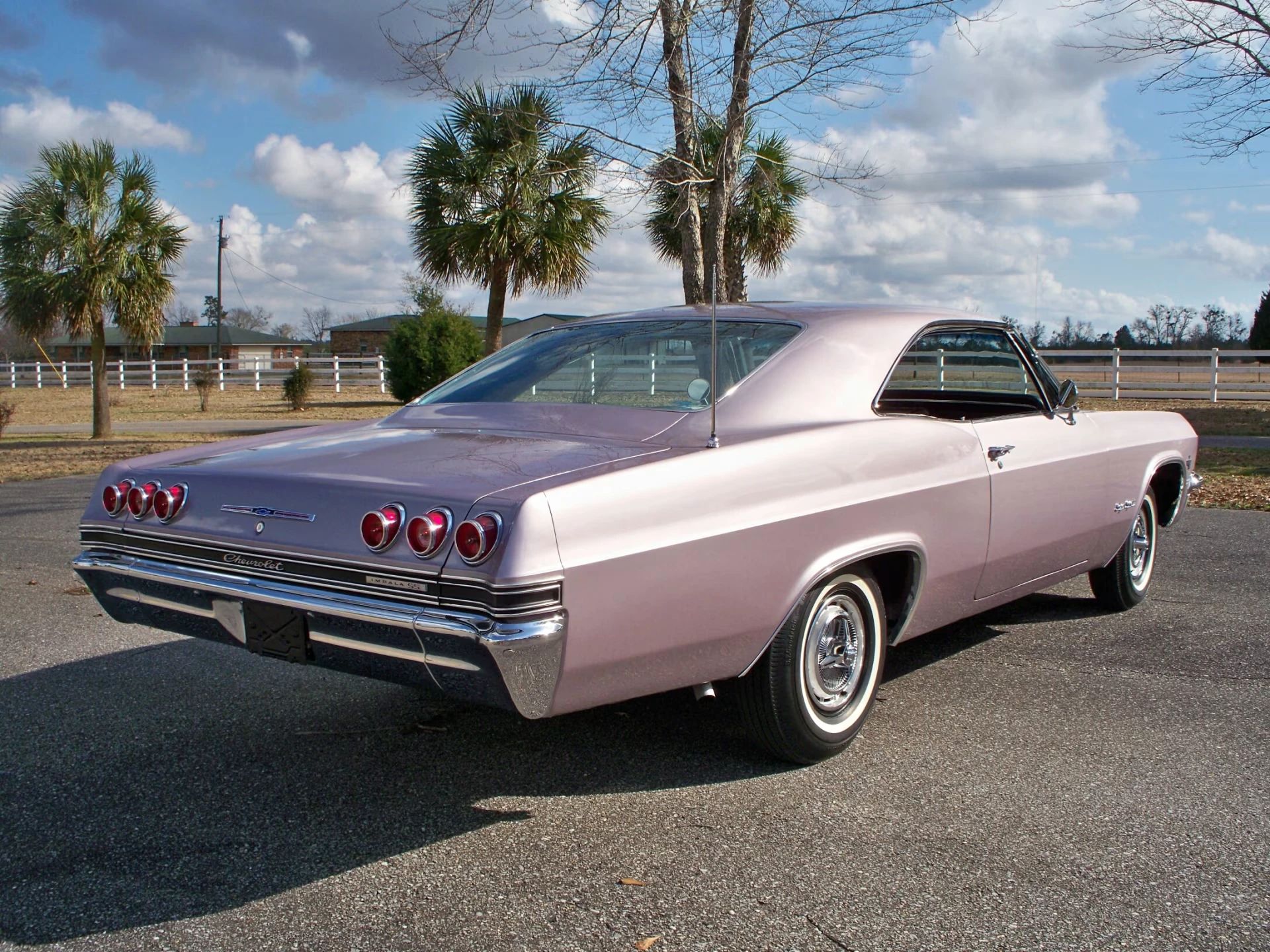 1965 Chevrolet Impala SS 409 4-Speed: In The Cool, Cool, Cool Of The Evening Orchid 19 Right rear 3q view of a 1965 Chevrolet two-door hardtop