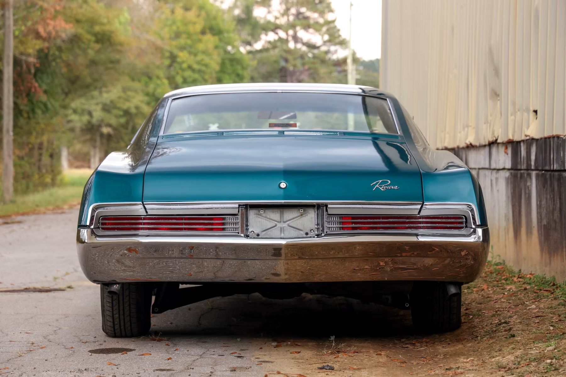 Rear end of turquoise 1966 Buick Riviera