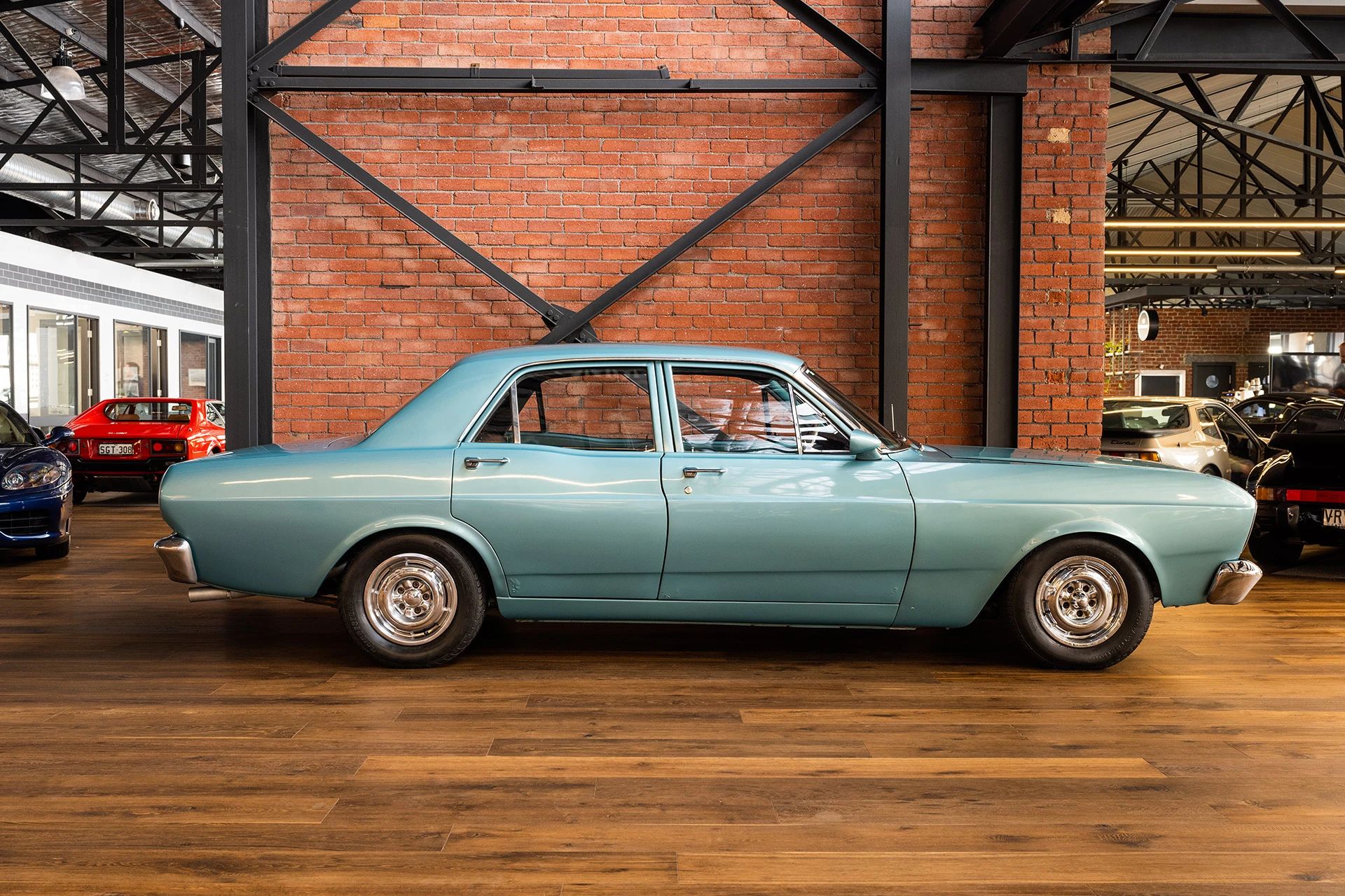 1966 Ford Mustang Limousine Conversion And A Possible (New) Mustang Sedan: Stretching An Idea Too Far 5 Right side view of a 1967 Ford Falcon XR sedan in a showroom
