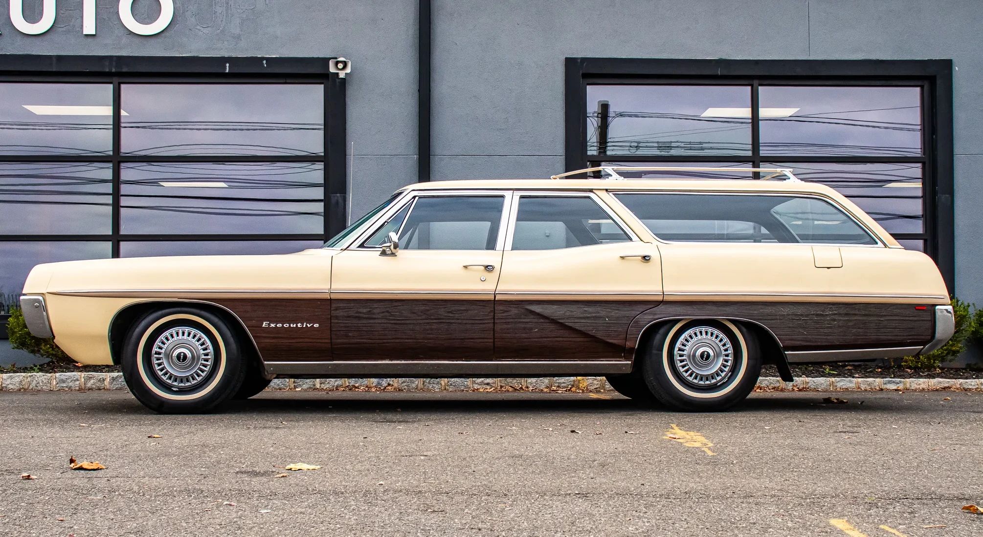 1967 Pontiac Executive Hardtop Coupe: The Star Chief Gets A Promotion 9 Left side view of a 1967 Pontiac station wagon with woodgrain side trim