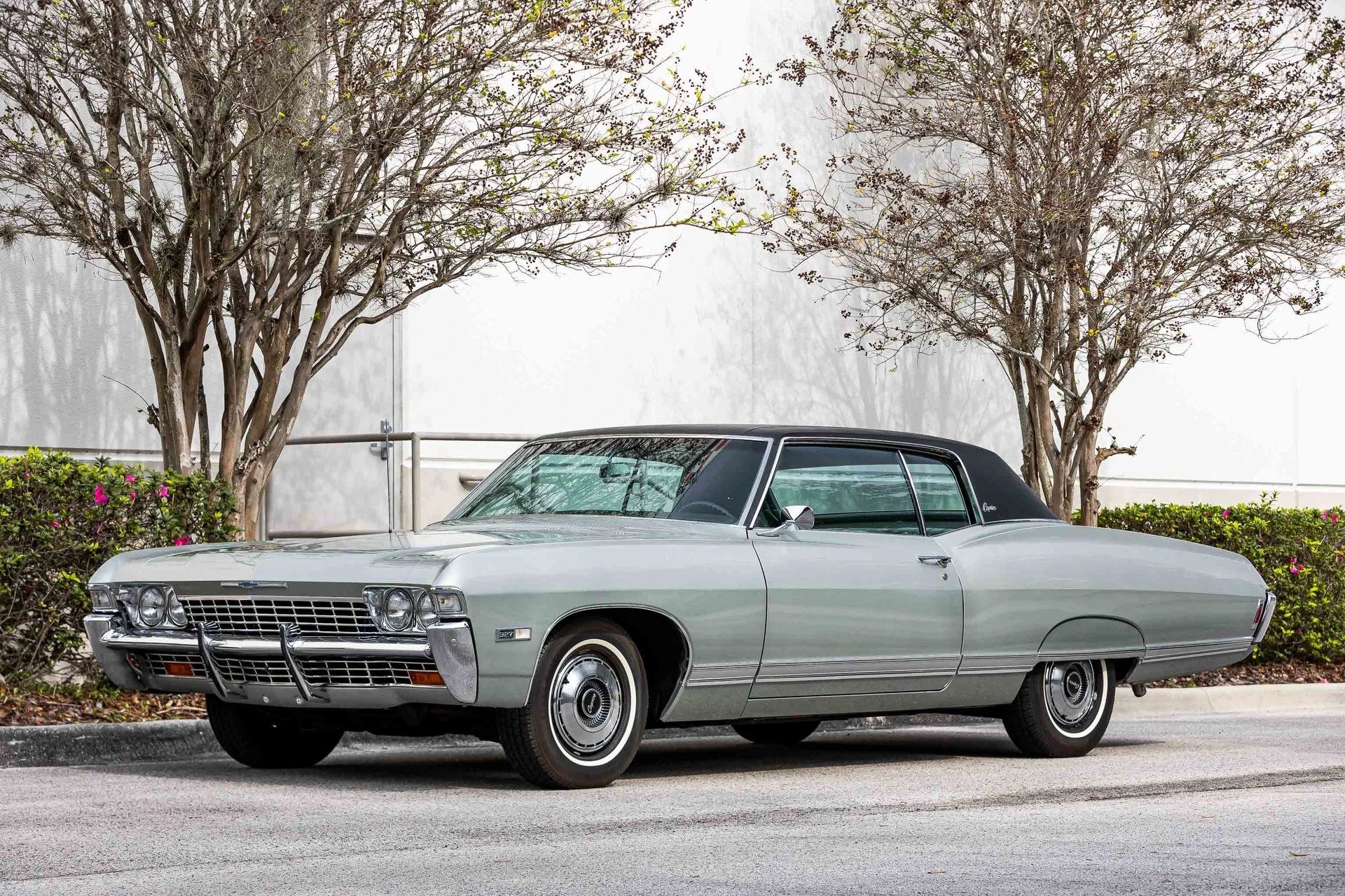 1968 Chevrolet Caprice Coupe: Chevrolet's Middle-Class, Medium-Price Luxury Contender 1 Left front 3q view of a Seafrost Green 1968 Chevrolet Caprice Coupe with a black vinyl roof