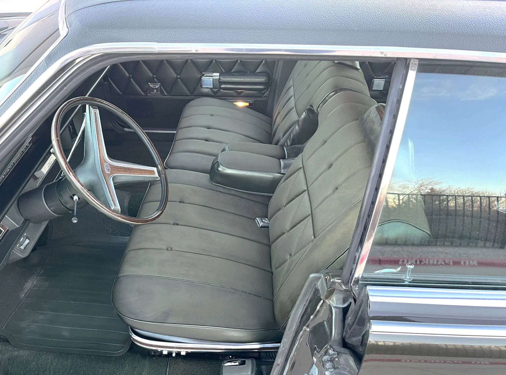 1970 Mercury Marquis Brougham Four-Door Hardtop: The Budget Continental 10 Front seat of a 1970 Mercury Marquis, seen through the driver's door