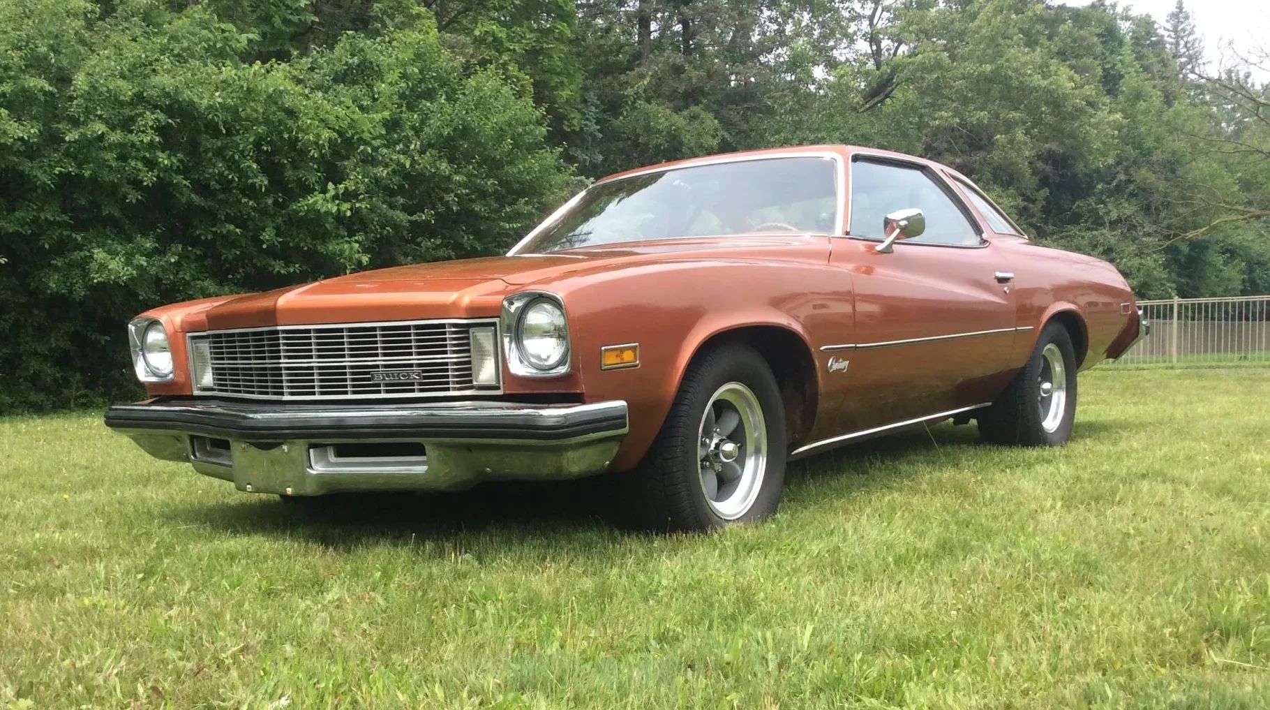 Front driver's side three-quarter view of brown 1975 Buick Century