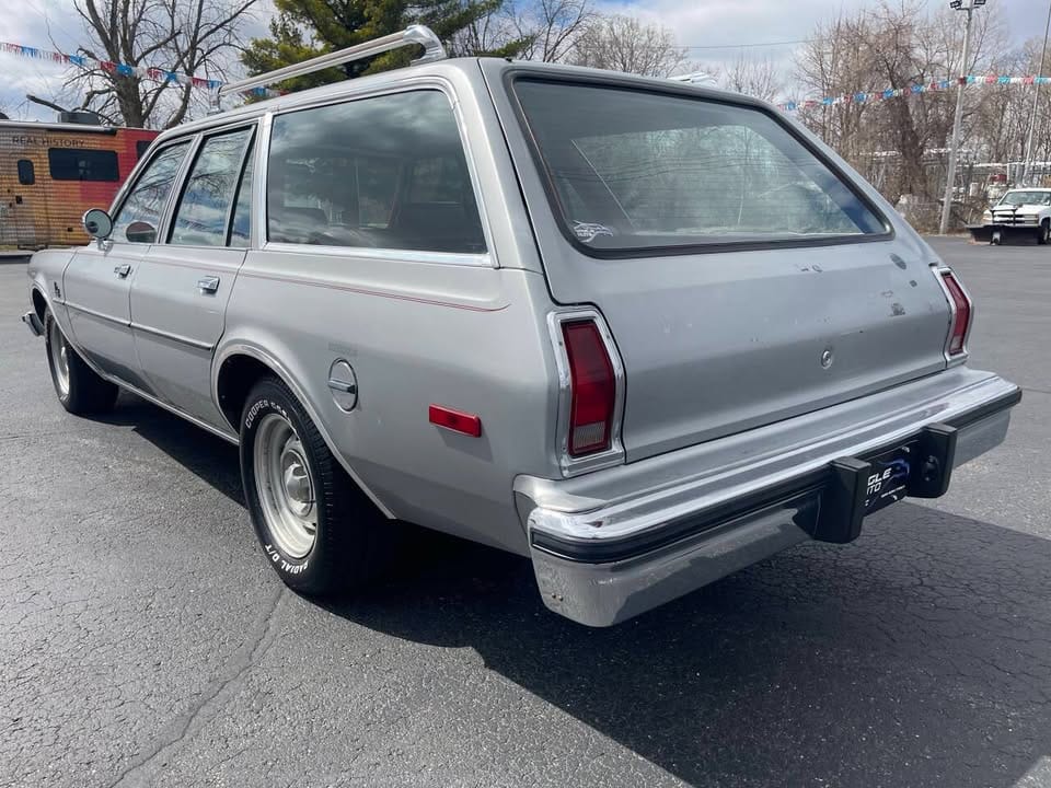 Driver rear three-quarter view of silver 1980 Plymouth Volare Station Wagon