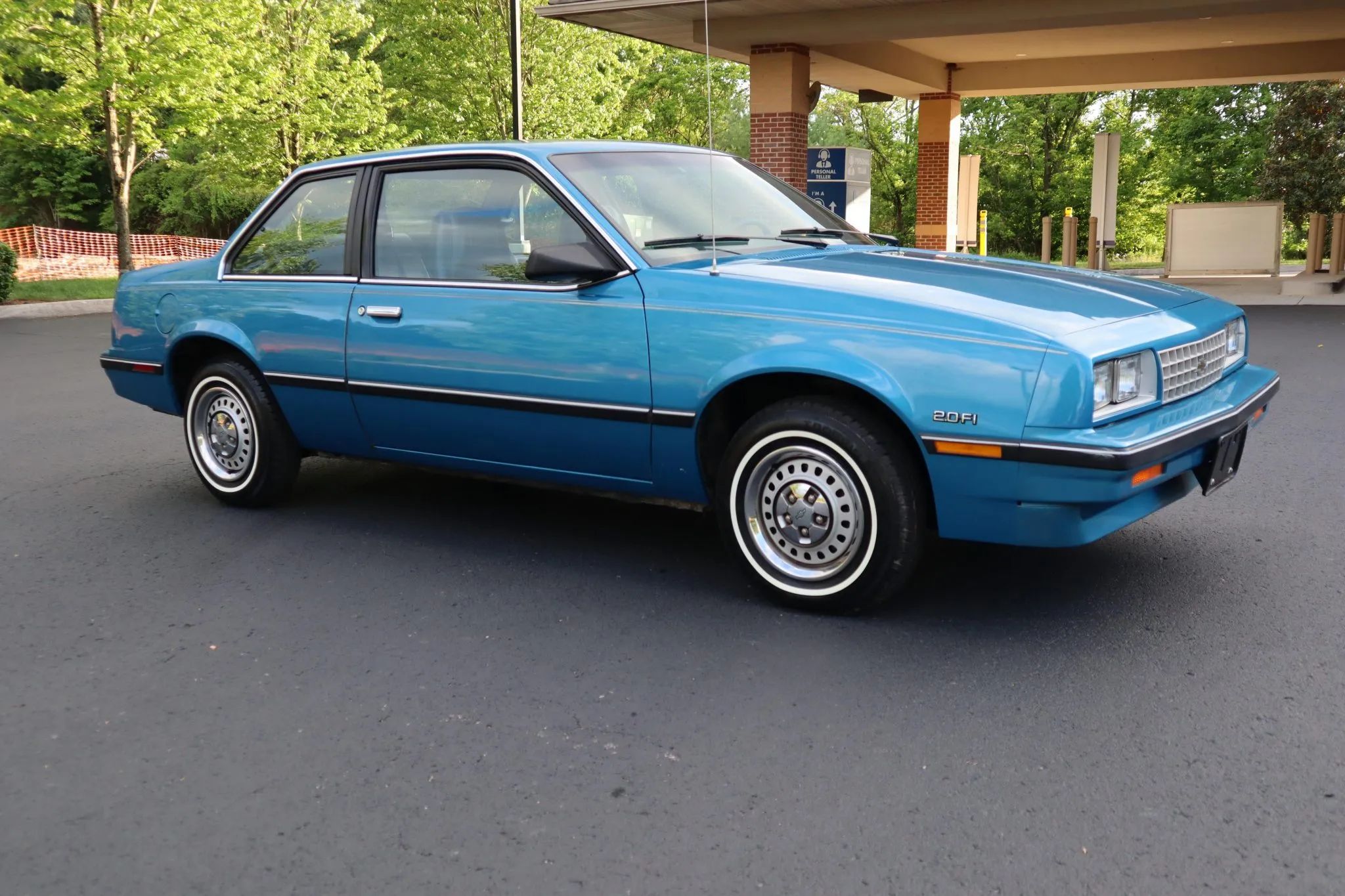 Right front 3q view of a Bright Blue Metallic 1986 Chevrolet Cavalier coupe