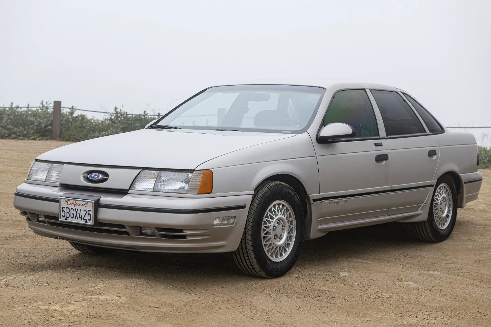 Left front 3q view of a Light Titanium 1989 Ford Taurus SHO sedan