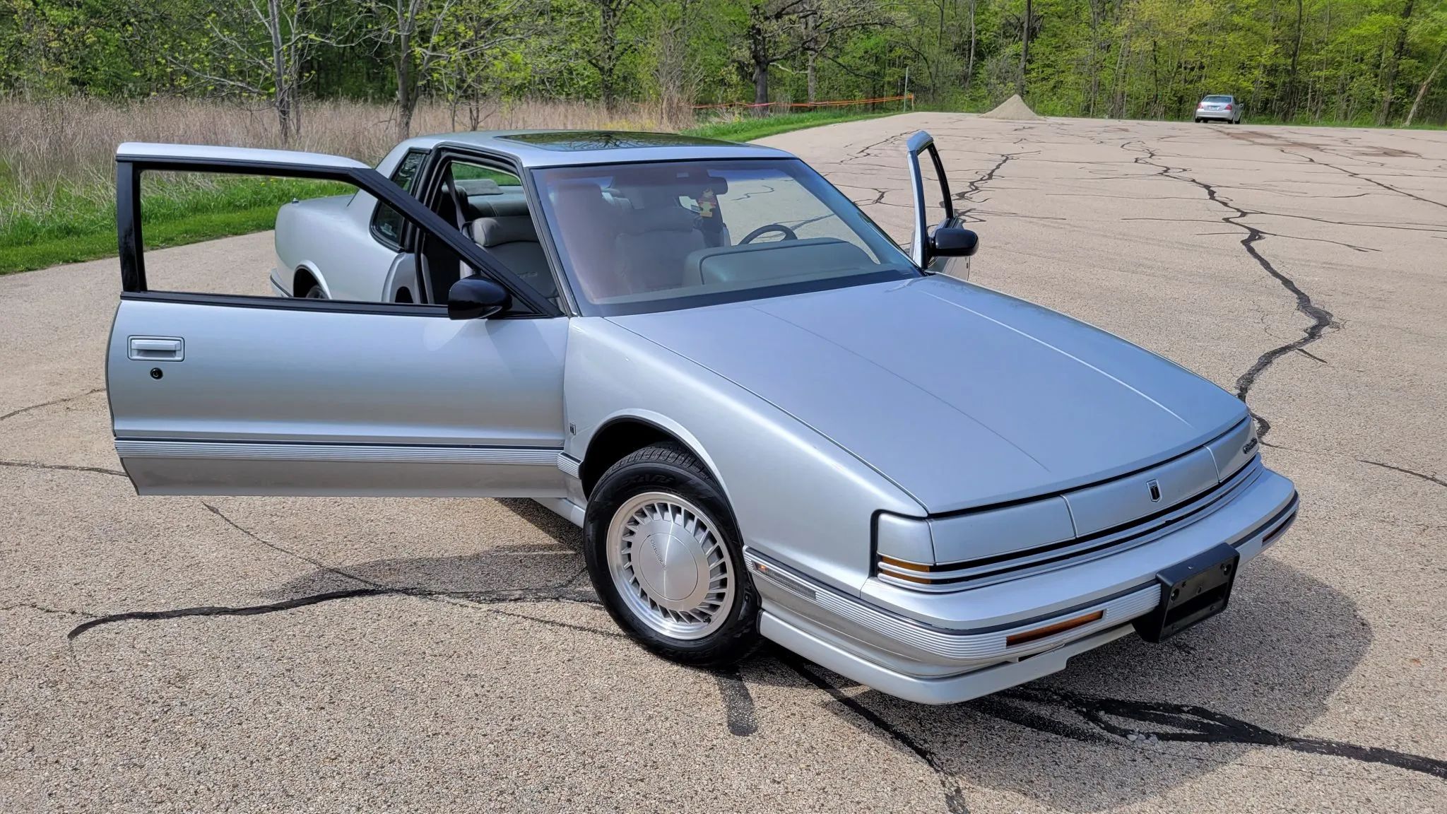 Front 3q view of a 1992 Oldsmobile Toronado with the doors open