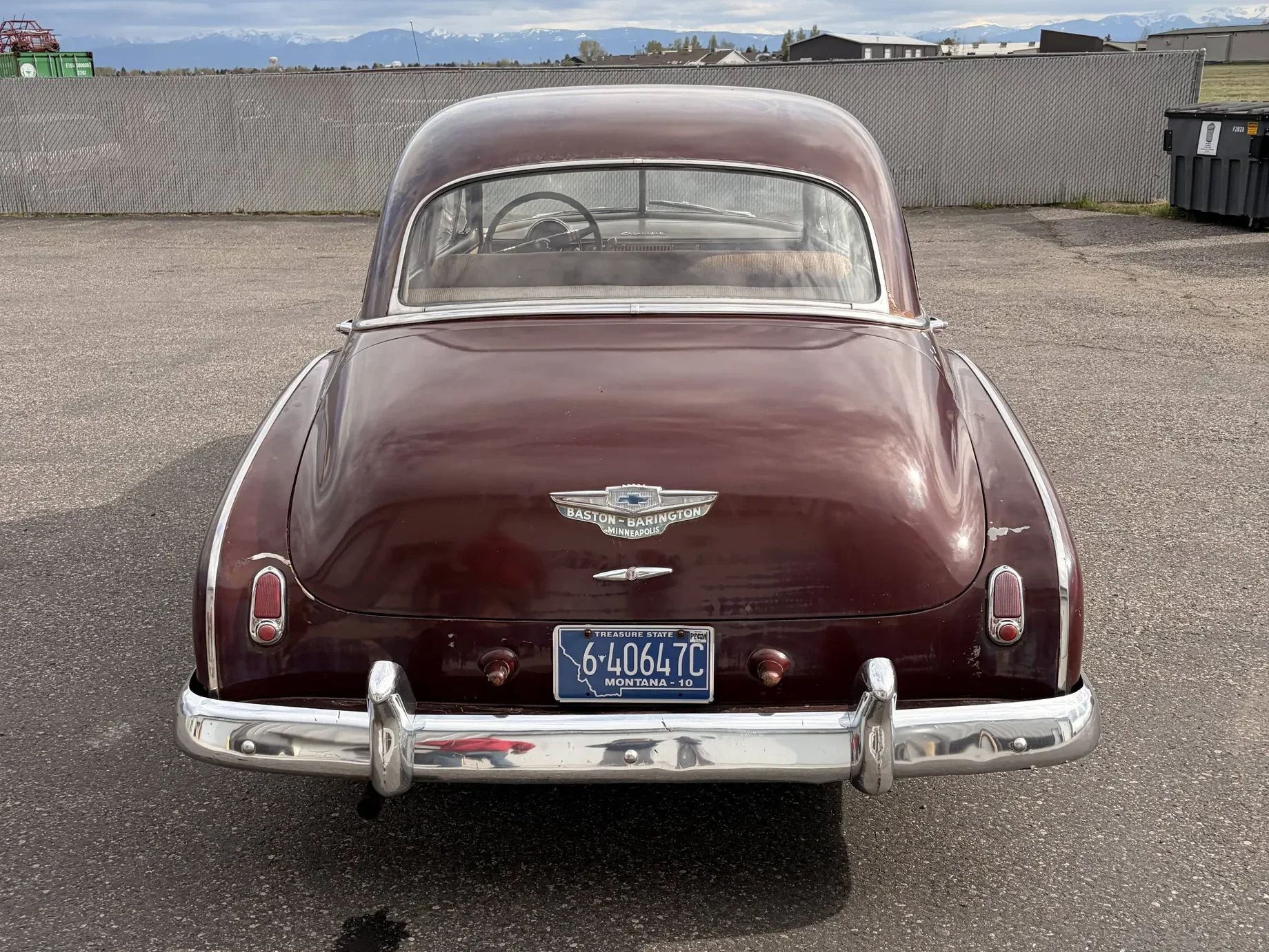 Rear end view of maroon 1949 Chevrolet sedan