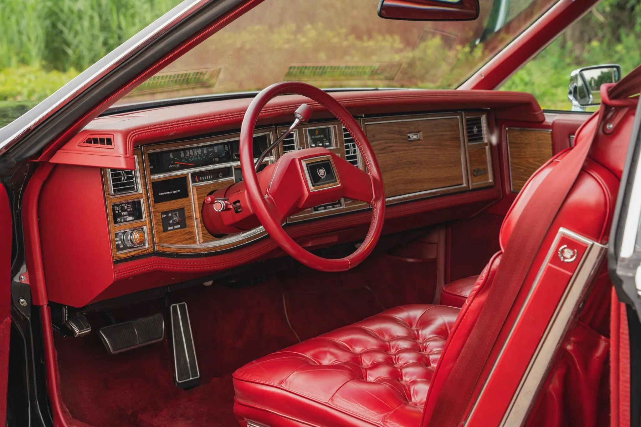 1983 Cadillac Eldorado Biarritz For Sale: Was It Really Cadillac's "Dream Machine?" 4 Picture of red interior of 1983 Cadillac Eldorado Biarritz