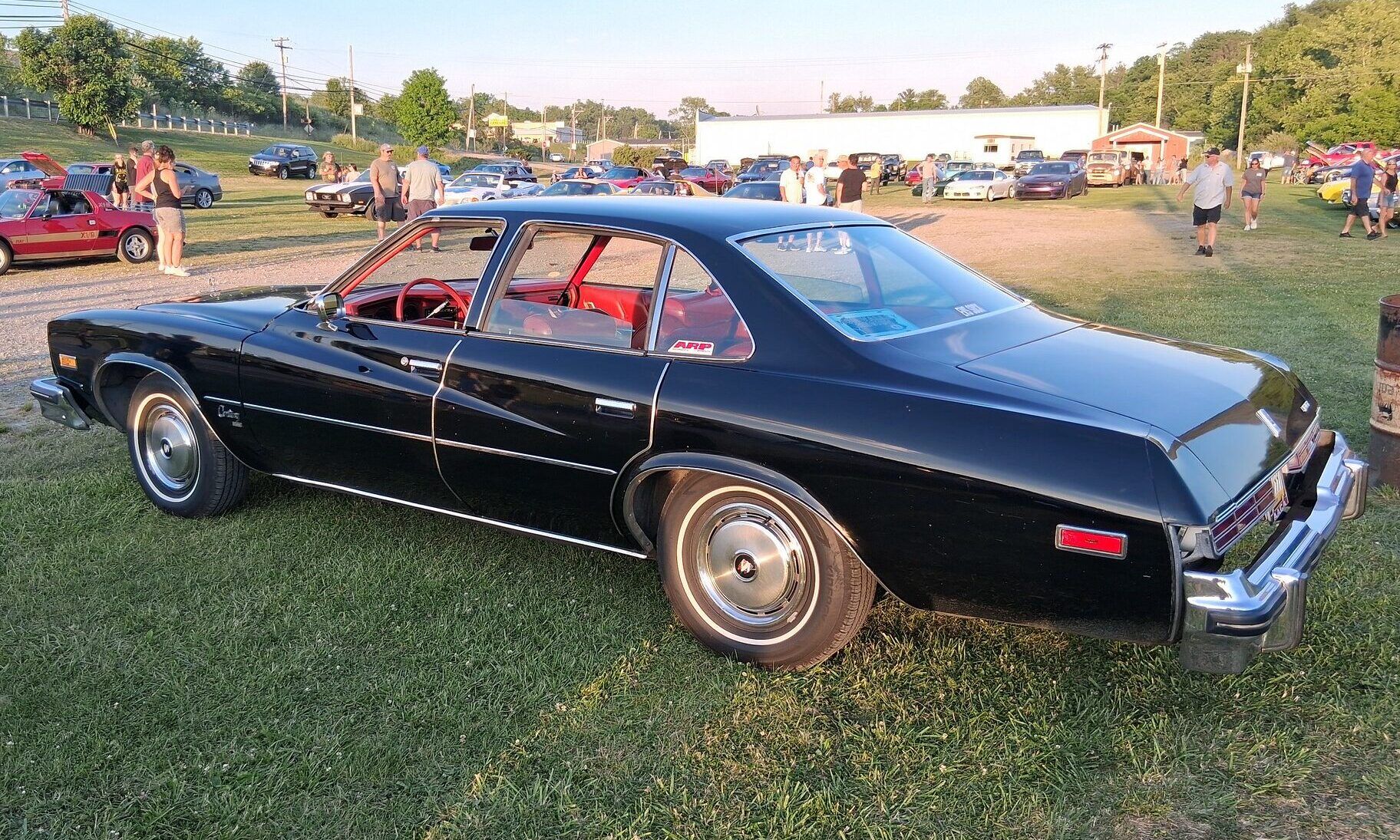 Driver's side view of black 1976 Buick Century Sedan