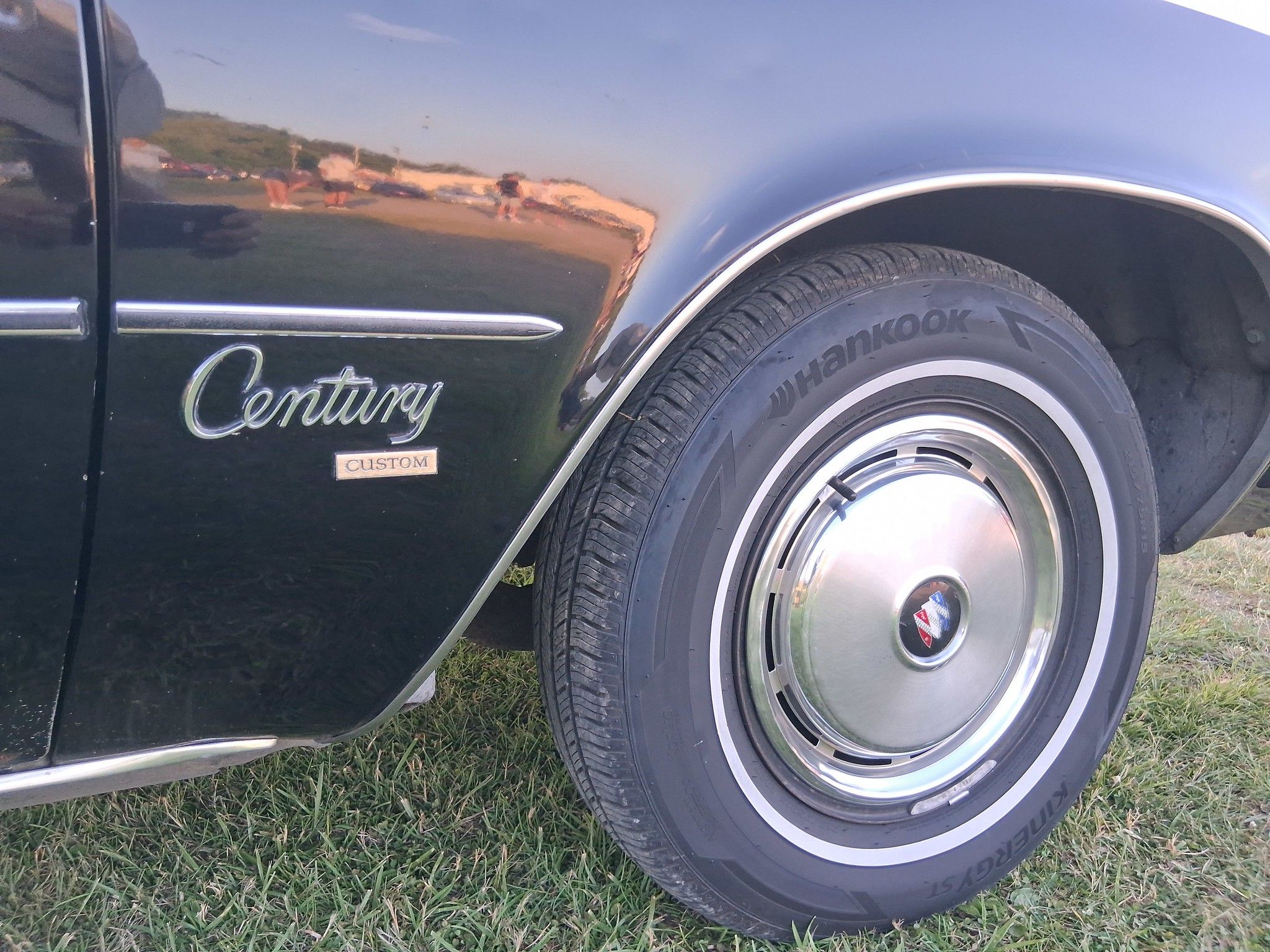 Passenger front fender of black 1975 Buick Century