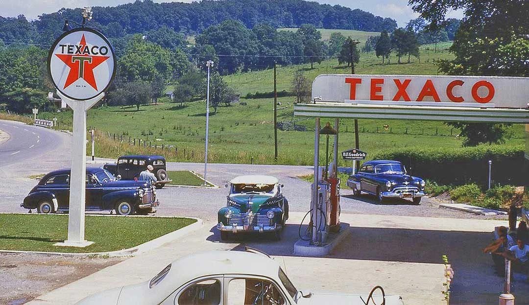 1949 Oldsmobile Rocket V-8 And The Ultra-High-Compression Economy Version That Never Made It 2 Vintage color photo of a Texaco station with 1940s cars
