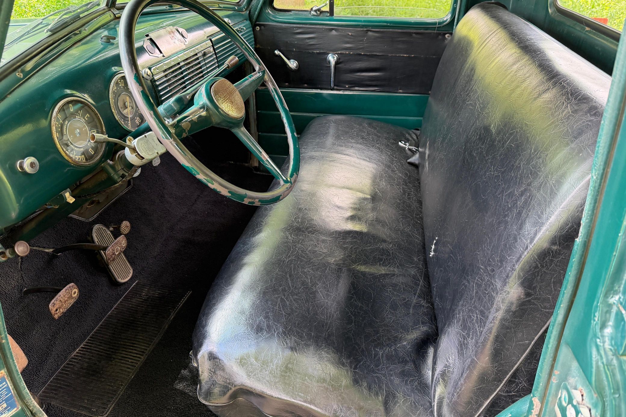Interior of green 1953 Chevy pickup truck
