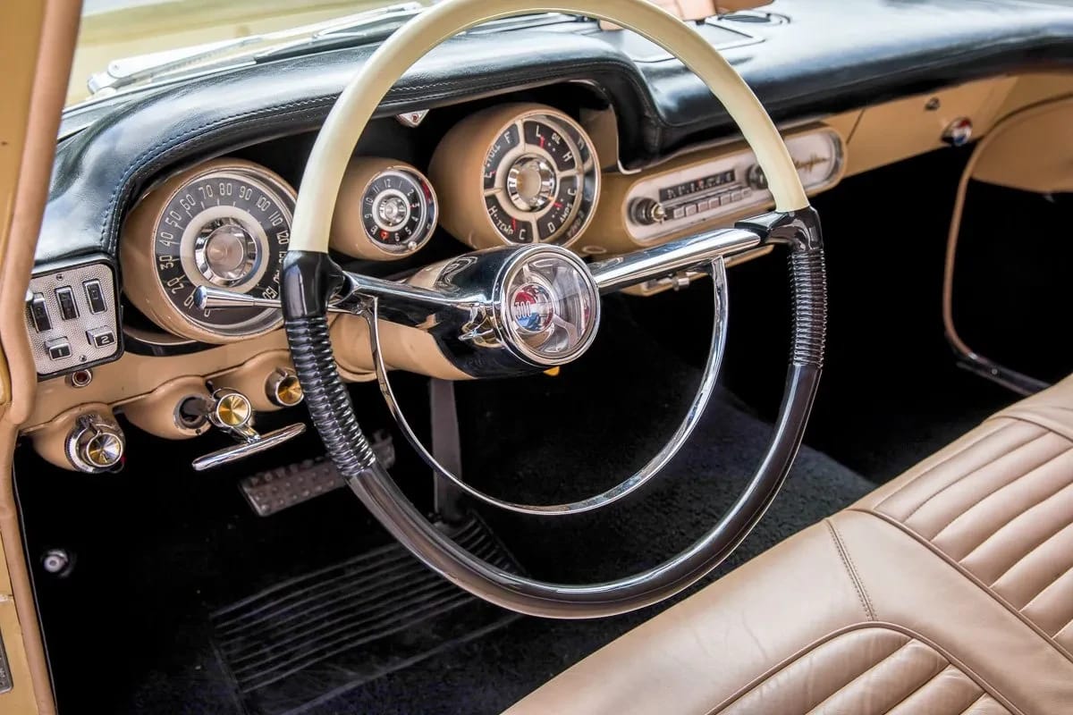 1957 Chrysler 300-C Hardtop: "America's Greatest Performing Car" In Ultra-Rare Champagne Gold 11 Two-tone steering wheel and dashboard of a 1957 Chrysler