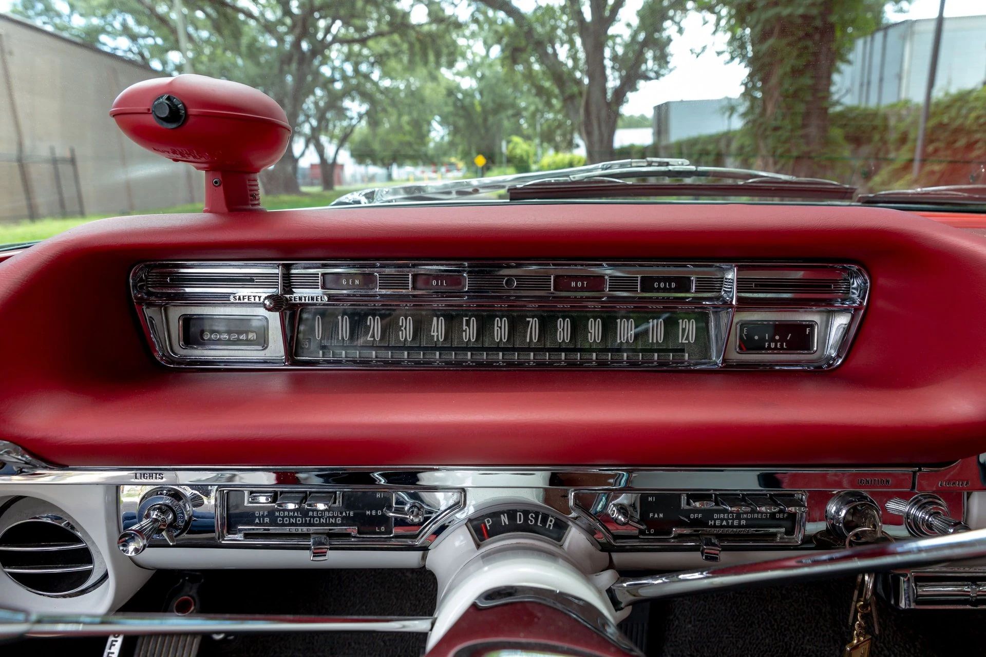 Instrument panel of a 1959 Oldsmobile, with a pod on top of the dash for the Autronic-Eye