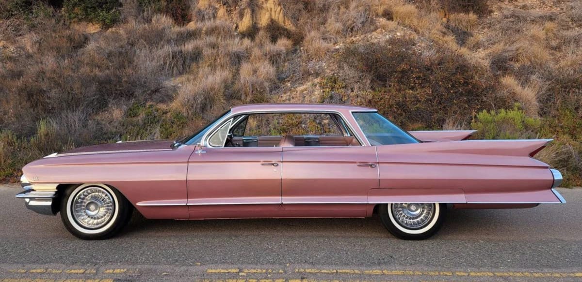 Left side view of a 1961 Cadillac four-window four-door hardtop
