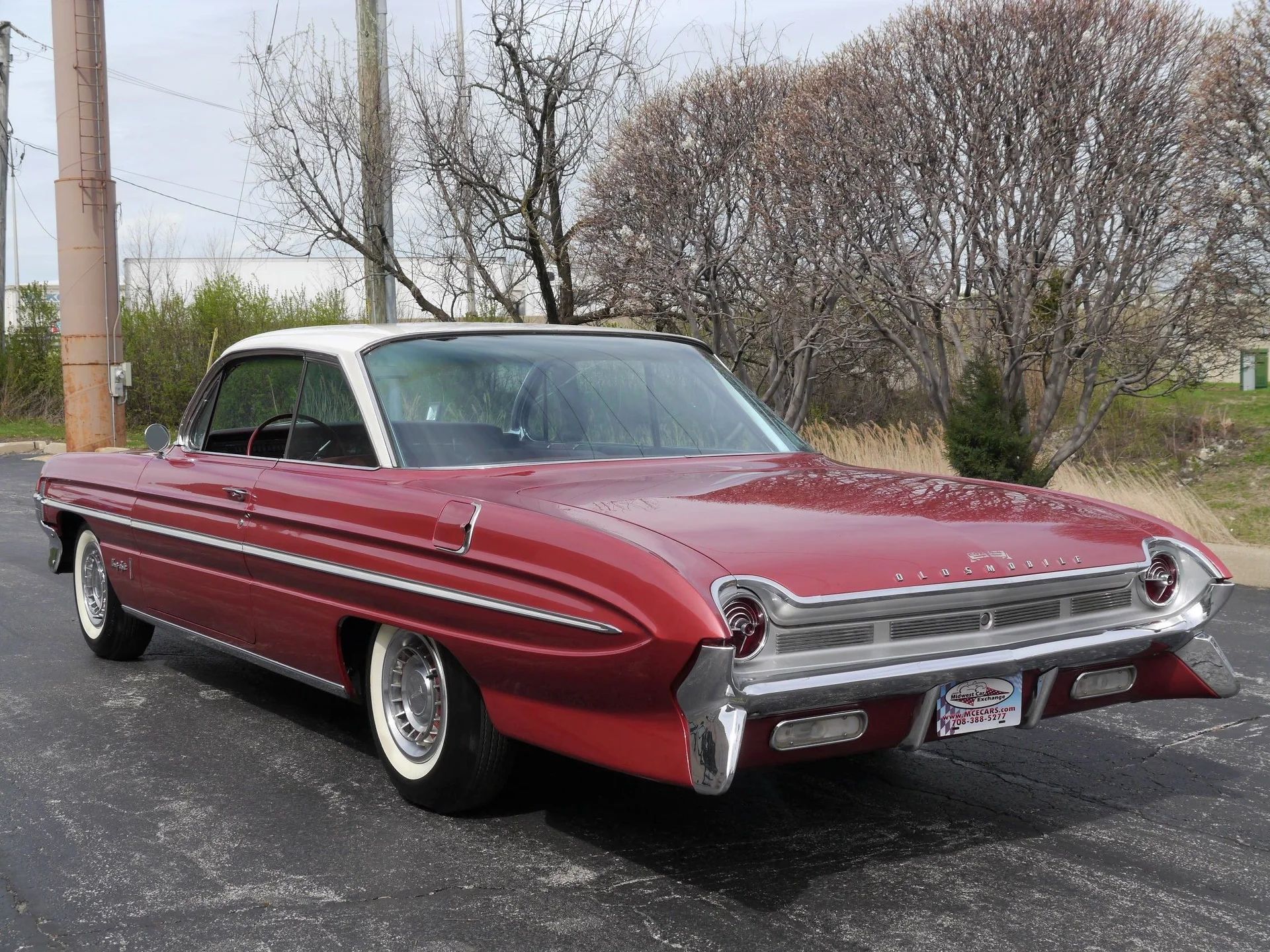 1962 Oldsmobile Ninety-Eight Holiday Coupe: A Sharper-Edged Roof Squares Off The Bubbletop 6 Left rear 3q view of a 1961 Oldsmobile 98 two-door hardtop