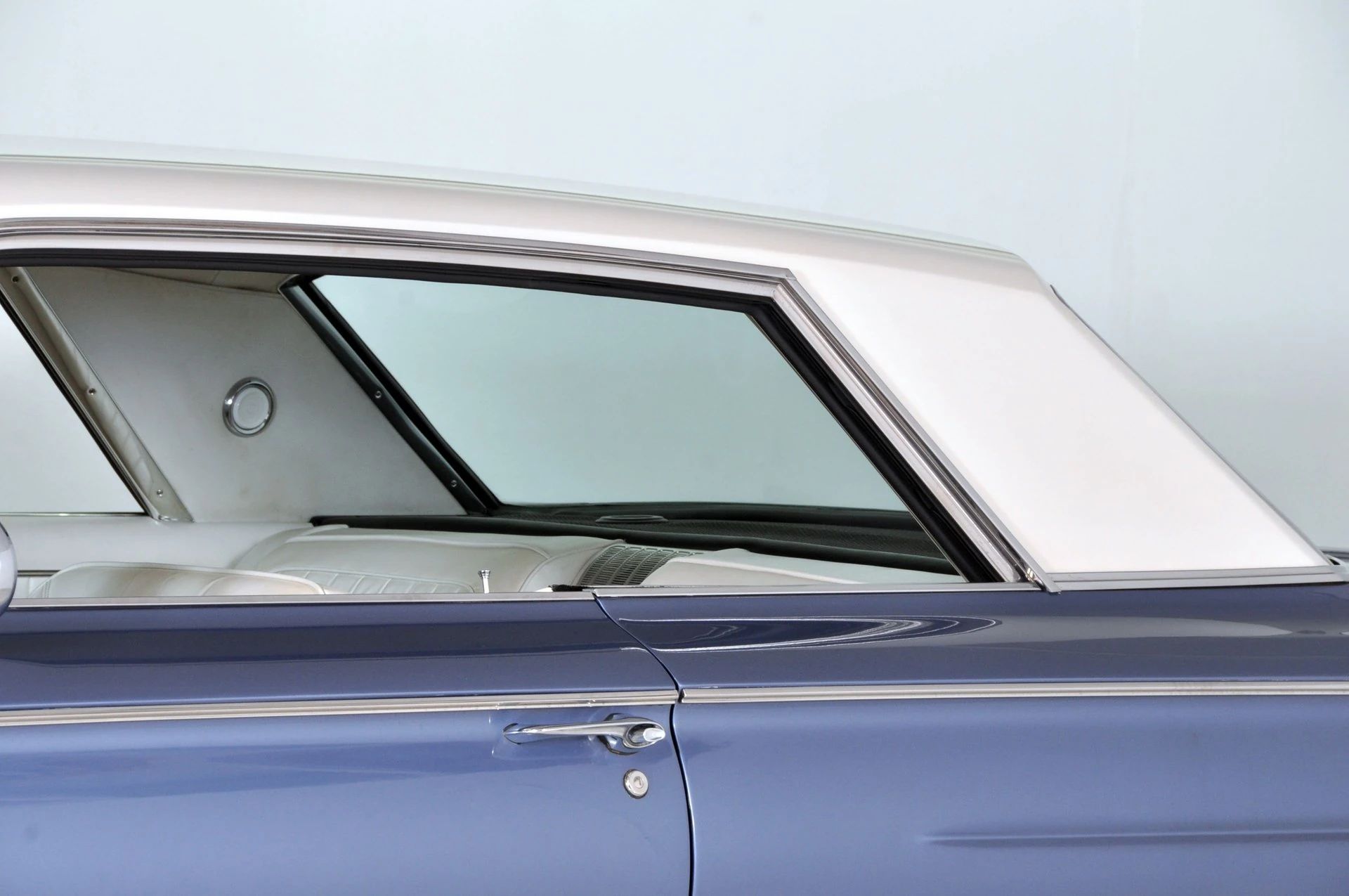 Roof of a 1962 Buick two-door hardtop with the side windows down