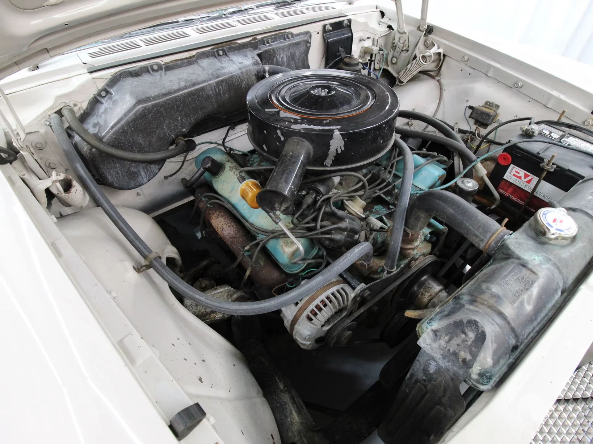 1962 Chrysler Newport 3-Speed Four-Door Sedan: Basic Big Car With An Upscale Badge And Not Much Else 13 V-8 engine in a 1962 Chrysler