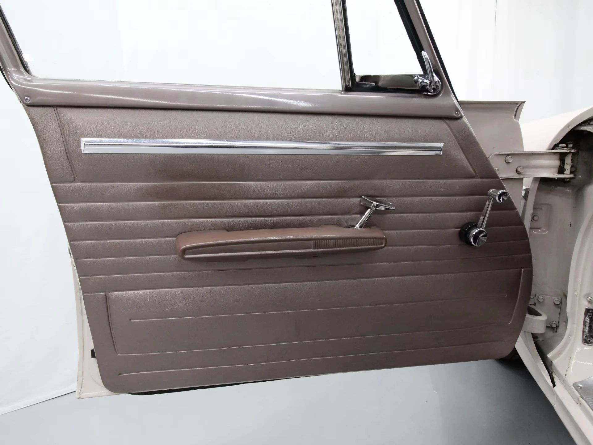1962 Chrysler Newport 3-Speed Four-Door Sedan: Basic Big Car With An Upscale Badge And Not Much Else 21 Driver's door trim in a 1962 Chrysler