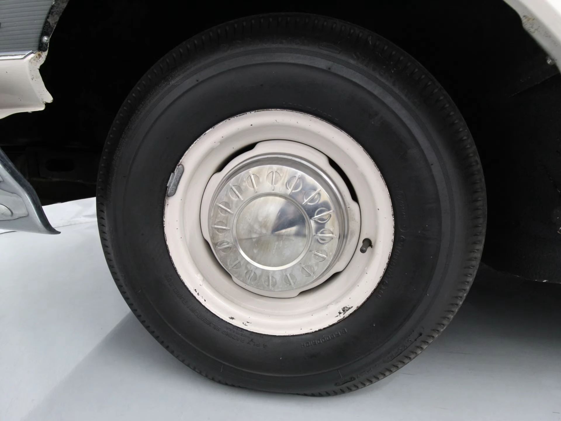 1962 Chrysler Newport 3-Speed Four-Door Sedan: Basic Big Car With An Upscale Badge And Not Much Else 14 Blackwall tire and hubcap