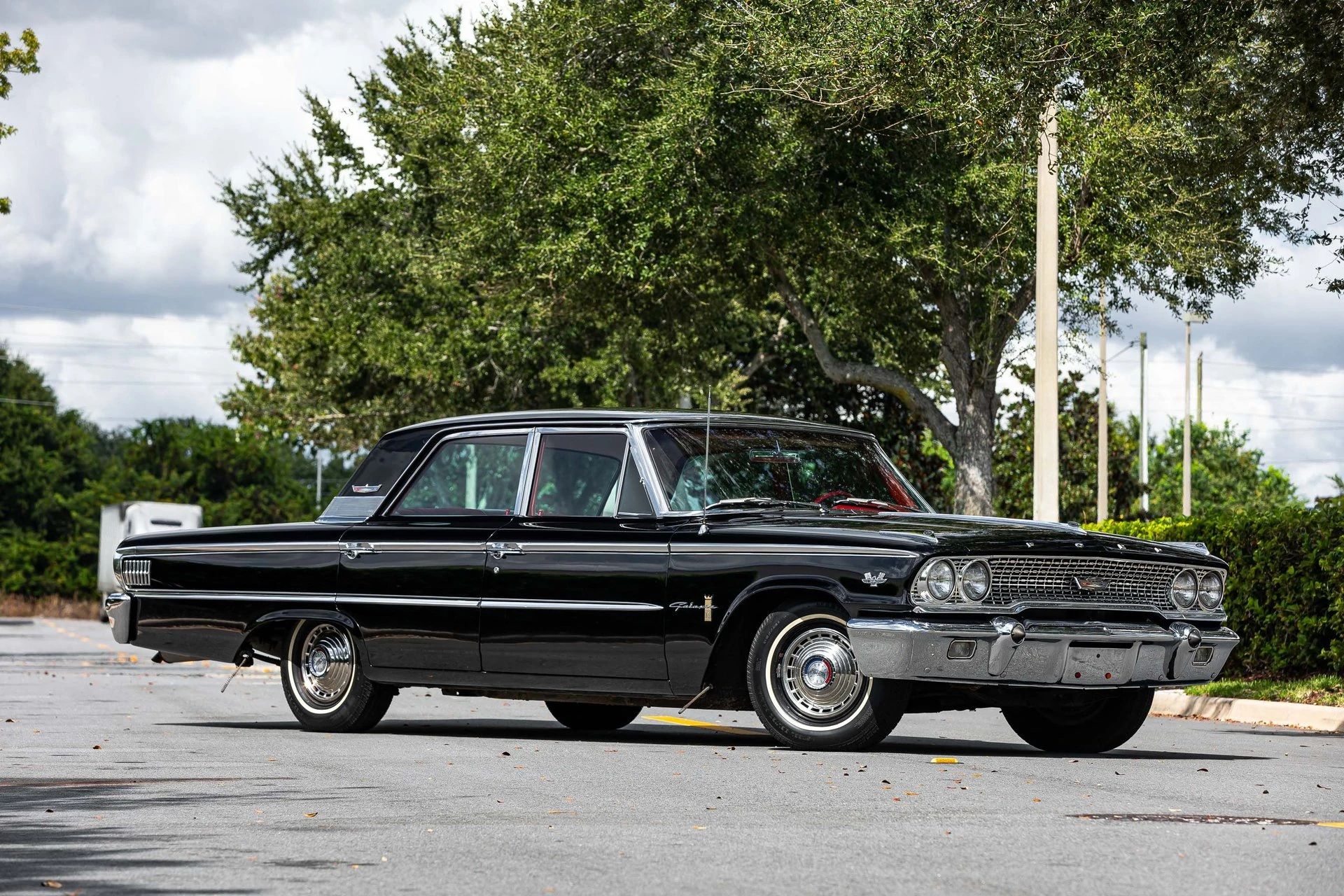 1963 Ford Fairlane 500 Sedan With 260 V8 And 3-Speed/Overdrive: Suddenly It's 1955 3 Right front 3q view of a 1963 Ford full-size four-door parked diagonally in the middle of a street