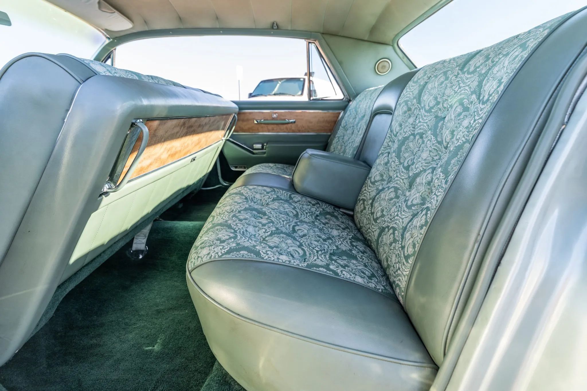 Rear seat of a 1964 Cadillac four-door hardtop, seen from the left
