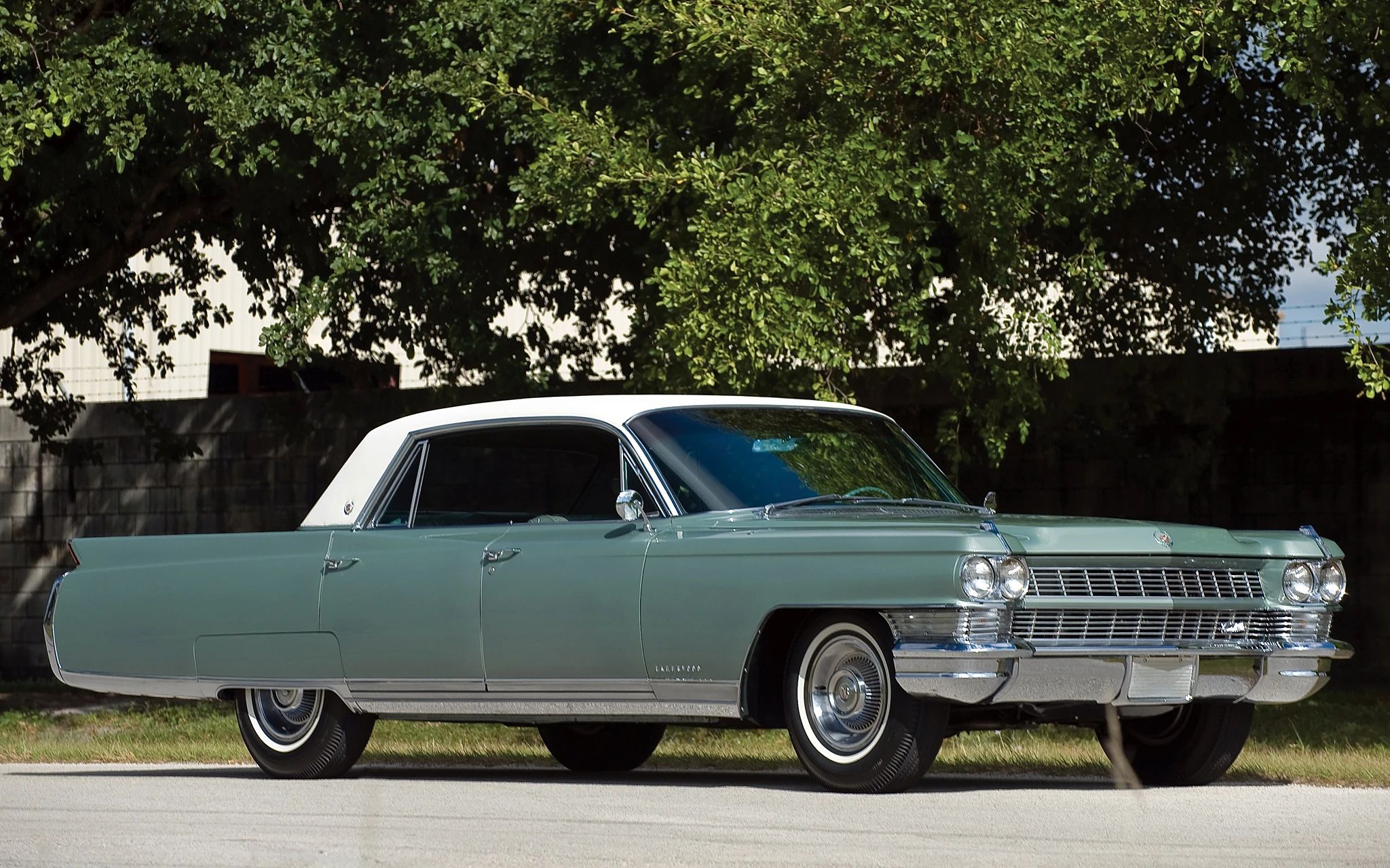 Right front 3q view of a 1964 Cadillac four-door hardtop with a vinyl roof