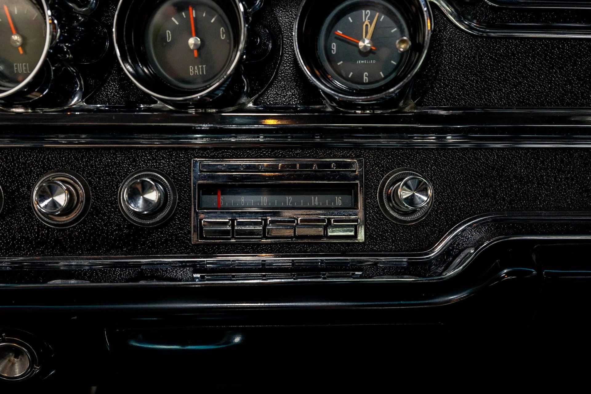 Gauges and radio in a 1965 Pontiac