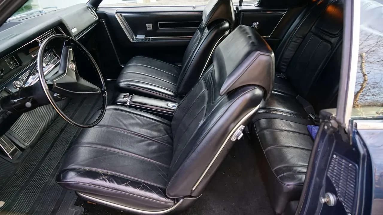 Front seats of a 1967 Cadillac Eldorado, seen through the driver's door
