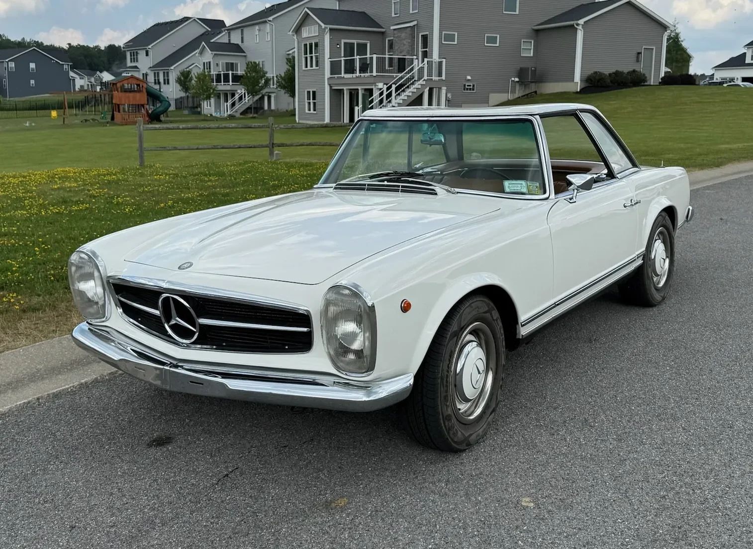 1967 Mercedes-Benz 250SL For Sale: A Well-Maintained Pagoda That Was Imported From Italy 1 Driver front three-quarter view of white 1967 Mercedes-Benz 250SL
