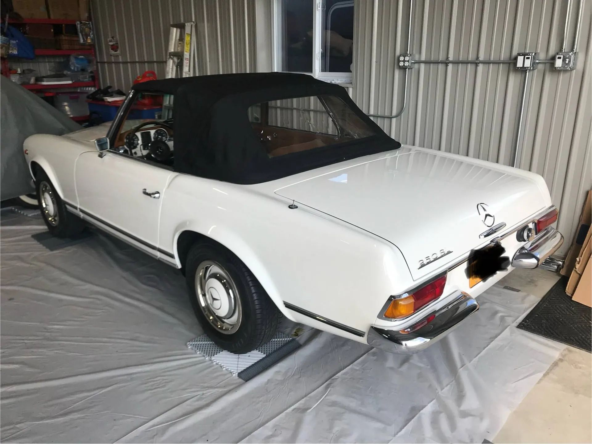 1967 Mercedes-Benz 250SL For Sale: A Well-Maintained Pagoda That Was Imported From Italy 6 Driver rear three-quarter view of white 1967 Mercedes-Benz 250SL with black convertible top