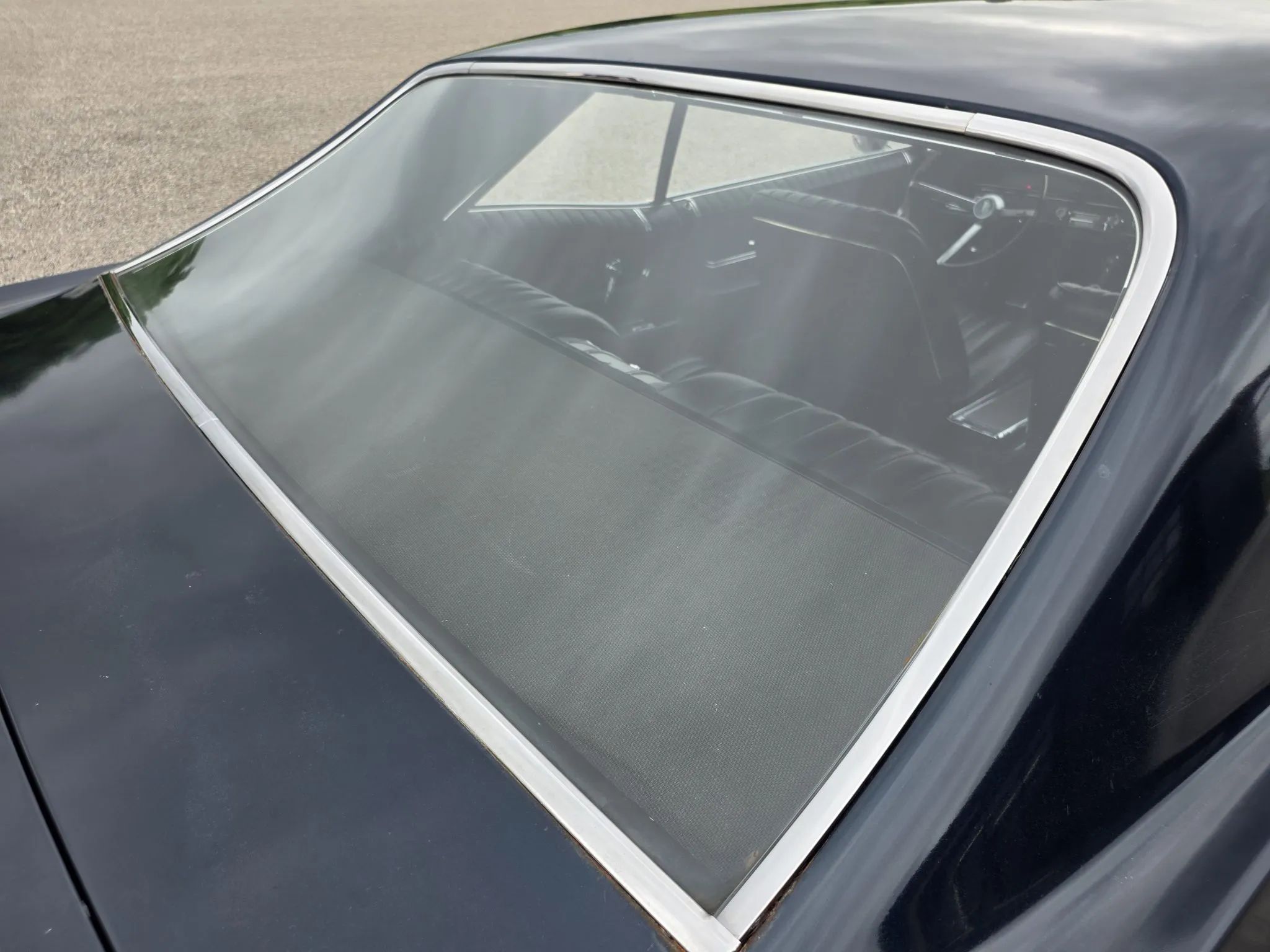 Back glass of a 1967 Pontiac Grand Prix hardtop