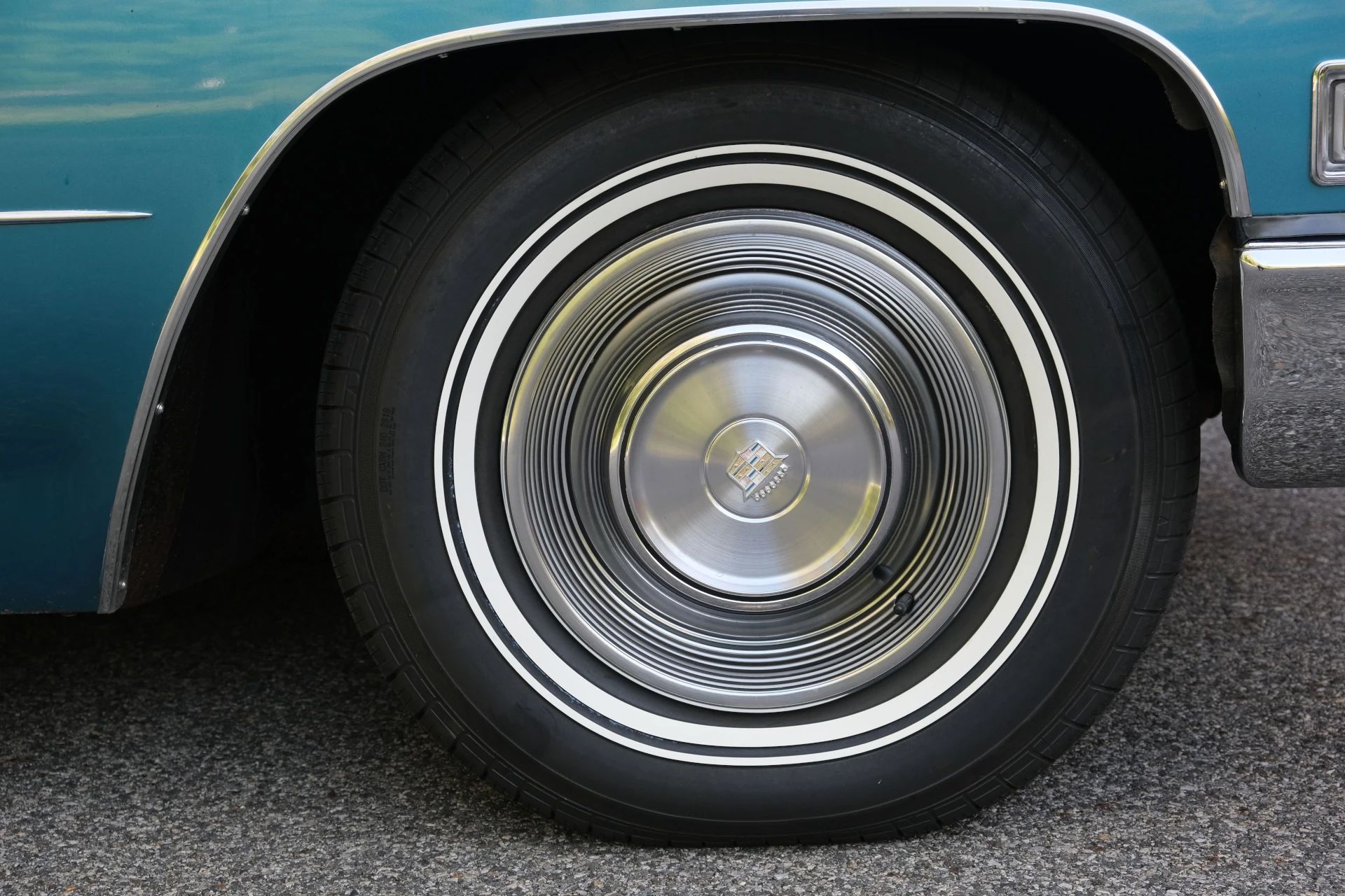 Right front wheel and whitewall tire on a 1968 Cadillac