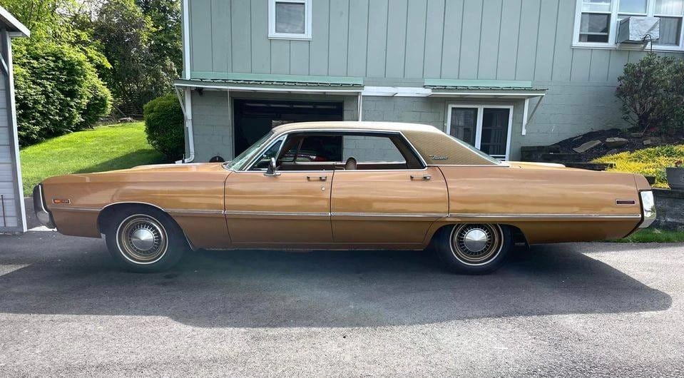 Left side view of a 1970 Chrysler four-door hardtop
