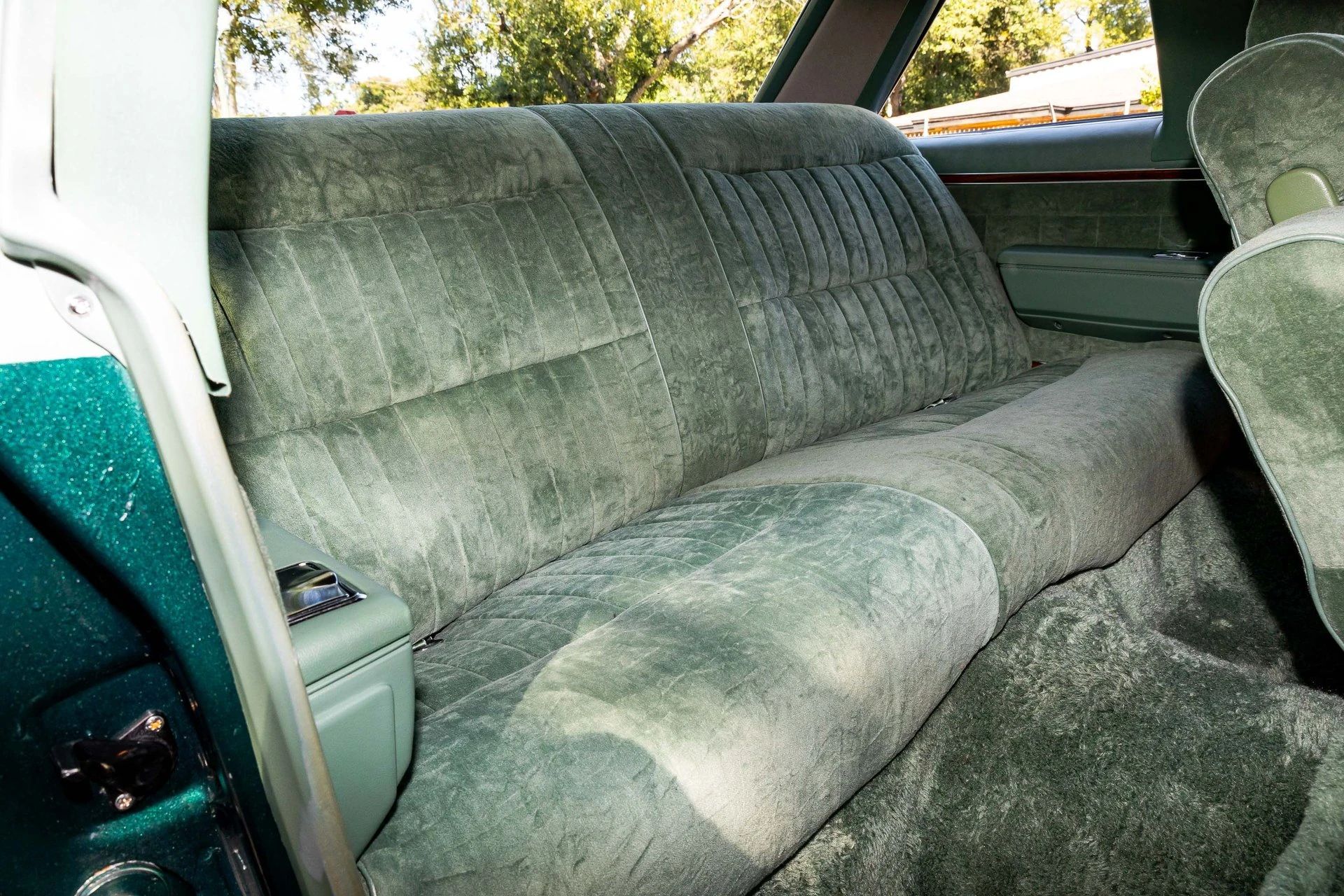 Back seat of a 1977 Pontiac coupe