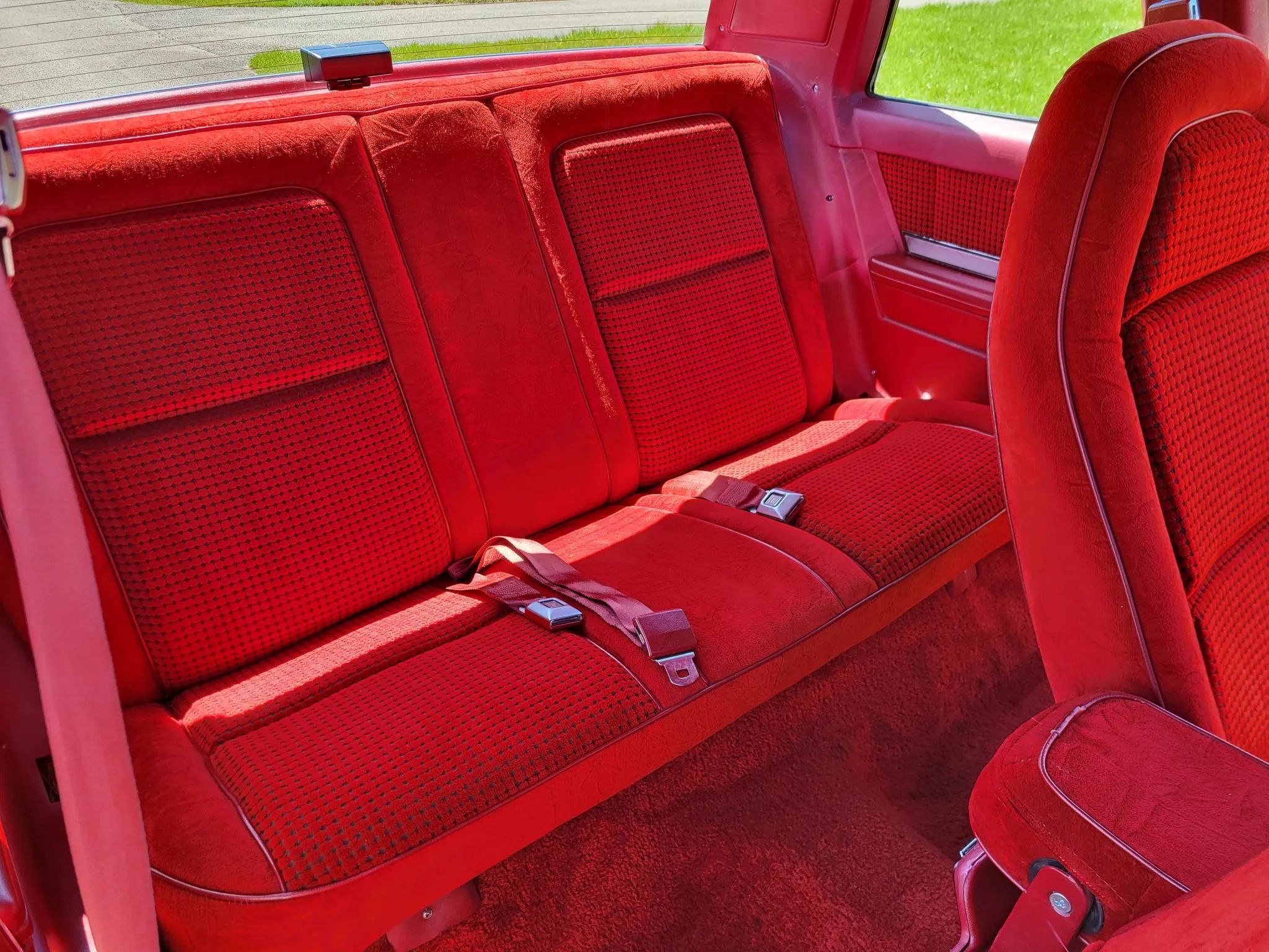 1980 Pontiac Phoenix LJ Coupe: Two Doors, Four Speeds, 32,349 Miles, Zero Credibility 10 Back seat of a 1980 Pontiac Phoenix coupe, seen through the passenger door